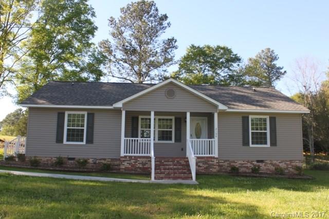 Cute as can be!  This ranch home offers an updated kitchen with granite counter tops and beautiful flooring.  Seller will be putting in stainless appliances.  Great room has a fireplace and built-ins, spacious dining area. Bathrooms have been updated as well.  Rocking chair front porch and a side entrance.