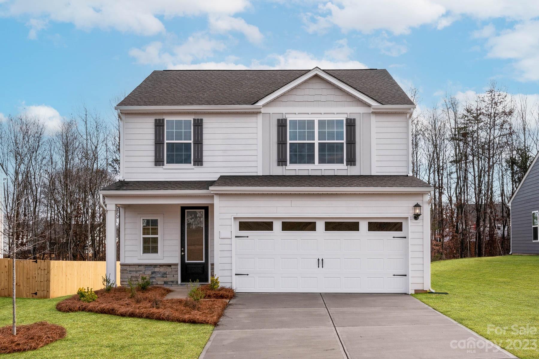 This two-story home has 4 beds, 2.5 baths and spacious common areas. As you enter the home and 
make your way through the foyer you will find yourself in the living room that is located directly off the 
chef-ready kitchen. The kitchen showcases granite countertops, recessed lighting, and white cabinets
with hardware, plus stainless steel kitchen appliances. A large island separates the kitchen from the 
family room, providing the ideal place for serving food. Upstairs is where you will find the master bedroom and large secondary bedrooms.