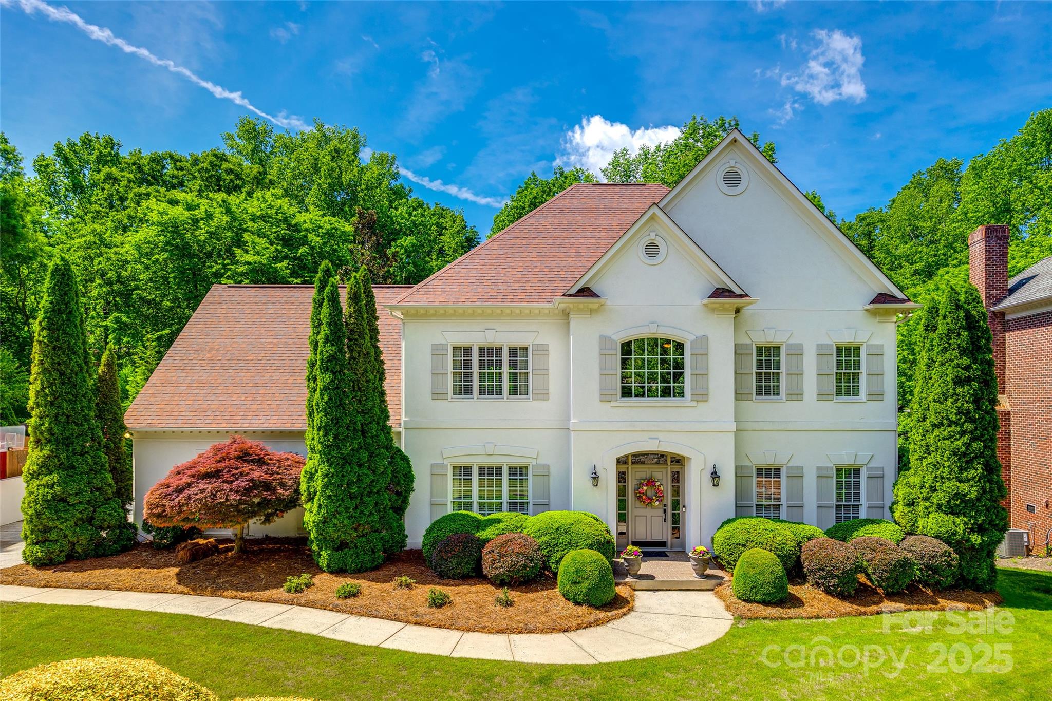 Welcome to this beautifully updated, hard coat stucco home nestled in the heart of Berkeley—one of South Charlotte’s most desirable neighborhoods and top school districts. This residence offers a perfect blend of elegance and comfort. The kitchen is newly remodeled and the home has fresh paint, new carpet, and upscale finishes. The spacious owner’s suite is a true retreat, complete with a private sitting area and a spa-inspired bath adorned with marble countertops. The lower level is built for entertaining and flexibility, showcasing a cozy brick fireplace in the rec room, a full bath, and bonus flex space—perfect for a home gym or guest suite.
Enjoy outdoor living at its finest with a screened porch, a lower-level patio, and a fully equipped built-in grilling station complete with a refrigerator, sink, and tumbled marble countertops. The Gunite pool and lush, mature landscaping transform the backyard into a private oasis—perfect for entertaining or relaxing in style.