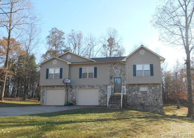 Stunning great room with bamboo floors, new colors, vaulted ceilings & well equipped kitchen with all appliances.  Split bedroom design with large master bedroom & adjoining bath, 2 additional bedrooms and bath on the main floor.  A full basement with double garage and a semi finished unheated family room. All new refrigerator, range, dishwasher, washer & dryer will remain. New architectural shingles in 2014.  Don't miss seeing this special home.