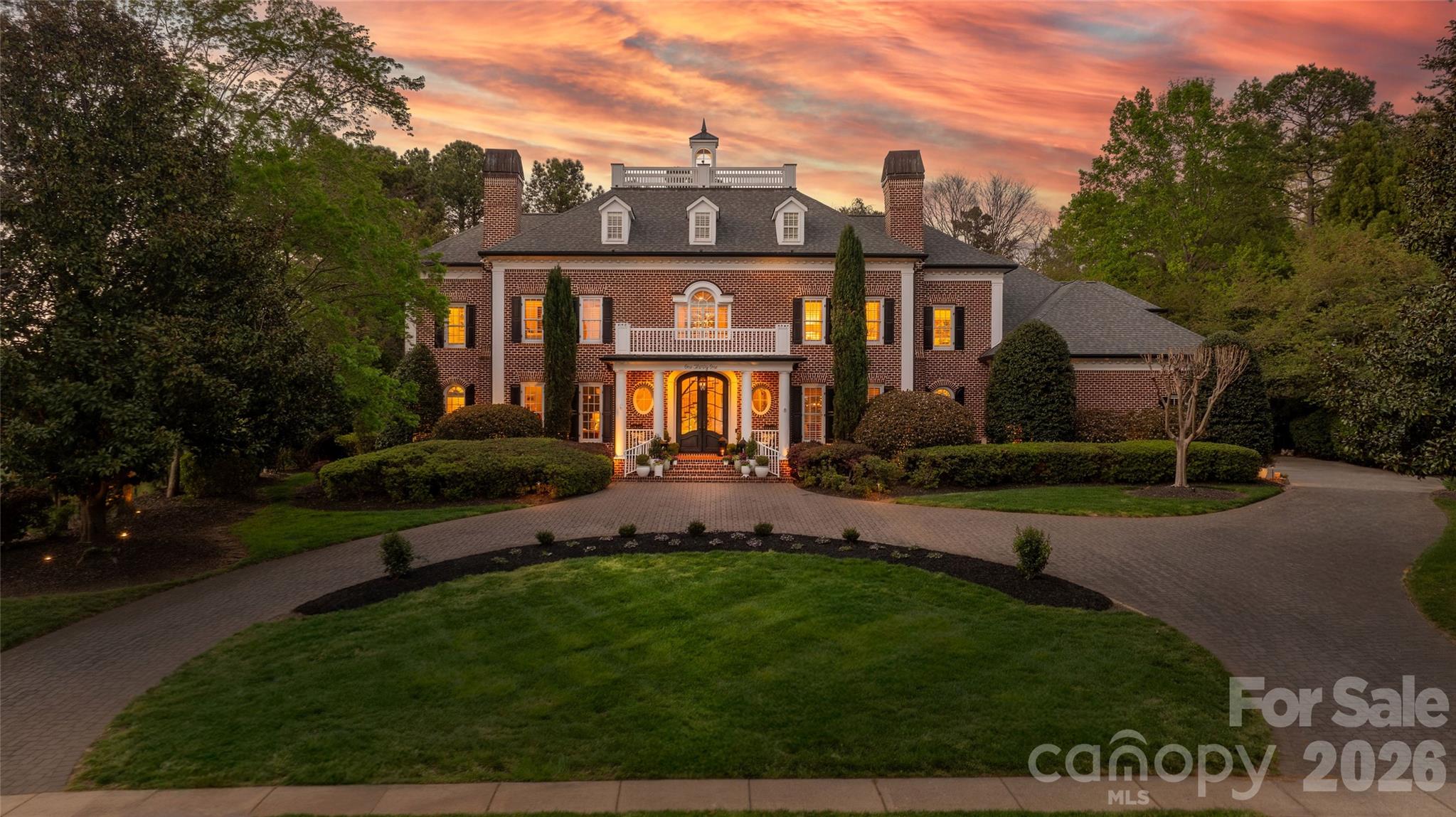 This beautifully upgraded Simonini Builders award winning home is a true turnkey masterpiece. Extensively renovated in 2019 and impeccably maintained ever since, the home boasts standout features including a fully renovated PebbleTec pool with new heater and pump, a low-maintenance high-grade AstroTurf backyard perfect for pets and entertaining, a climate-controlled 250-bottle wine cellar with custom iron door and remote accent lighting, $22,000 in custom sliding barn-door cabinetry with Carolina Custom epoxy flooring in the garage, a new roof with upgraded GutterGuards, a tankless water heater, and a fully encapsulated crawl space. Inside, you’ll find fresh paint throughout with elegant millwork, custom accent walls in every secondary bedroom, shiplap detailing in the bonus room, a chef’s kitchen featuring JennAir and Thermador appliances, a drawer microwave, InSinkerator instant hot water dispenser, and refreshed cabinetry, plus spa-like bathrooms with walk-in showers in all secondary baths, heated floors in the primary suite, and a dramatic back-lit mirror in the powder room. Additional luxuries include dimmer switches on nearly every light, recessed outlets behind all artwork, and a hydraulic TV mount that lowers the TV to perfect eye level in the upstairs living room. Perfectly situated directly on the 9th green of the world-class Greg Norman Championship Golf Course at Trump National Golf Club, this premier location delivers stunning golf course views and effortless walking access to The Point’s resort-style amenities, including tennis courts, pools, dining, fitness center, and clubhouse. A deeded boat slip (Dock H, Slip 8) conveys with the property, offering the ultimate Lake Norman golf and lake lifestyle in one of the area’s most prestigious communities.