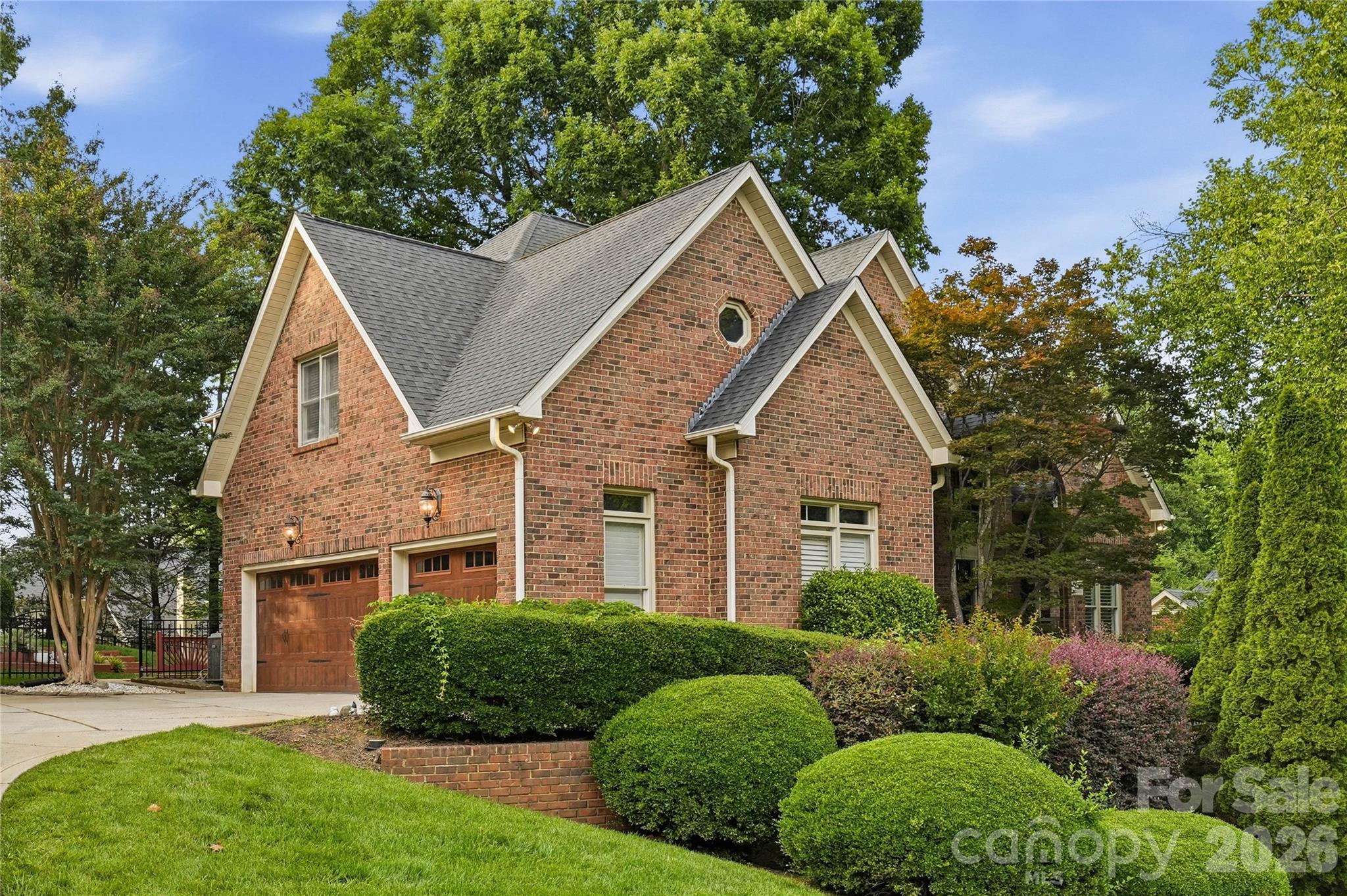 Showings begin June 25! 

Tucked away on a quiet cul-de-sac in one of Ballantyne's best-kept secrets, this beautifully maintained full-brick home offers the perfect blend of space, style, and convenience. Featuring a desirable 3-car garage and mature landscaping, this home has been lovingly cared for by its long-term owners and is truly move-in ready.

Step inside to an impressive two-story foyer flanked by a private office and formal living room. The thoughtfully designed floor plan continues with a formal dining room and spacious family room with custom built-ins. Fresh paint, updated lighting, and beautiful hardwood floors throughout the main level create a warm and inviting atmosphere.

The renovated kitchen is a standout, featuring new cabinetry, quartz countertops, ceramic tile backsplash, KitchenAid 5-burner cooktop, double ovens, and a sunny breakfast area with bay windows and a vaulted ceiling.
Upstairs, the spacious owner's retreat offers a double-door entry, elegant tray ceiling, custom-designed closet system, and a beautifully updated ensuite bath. Additional upgrades include a custom pantry organization system and new flooring in the basement, providing even more functional living space.

Enjoy outdoor living on the oversized deck overlooking a private backyard framed by mature trees and landscaping.
Ideally located with quick access to I-485, Ballantyne Corporate Park, and the vibrant Ballantyne Bowl, where you'll enjoy dining, entertainment, green spaces, and community events just minutes from your doorstep.
This is the Ballantyne home you've been waiting for.