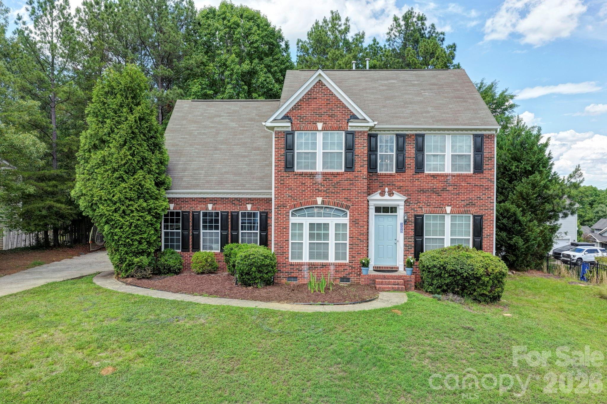 Excellent opportunity to get into this desirable Clover community while staying under $500,000. Welcome to 305 Hydrangea Drive, offering space, value, and access to award-winning Clover schools. Inside, you'll find a functional and flexible layout, beginning with a dedicated flex room off the two-story foyer—ideal as a home office, playroom, or second living space. The formal dining room features a tray ceiling and chair rail molding and connects conveniently to the kitchen, which offers granite countertops, stainless steel appliances, and overlooks both the breakfast area and living room with fireplace. One of the standout features of the home is the bright sunroom, providing additional living space and direct access to the back deck. Upstairs are four bedrooms and two full baths, including the spacious primary suite with tray ceiling, large walk-in closet, and private bath featuring a dual vanity, soaking tub, and separate shower. In addition to the 476-square-foot two-car garage, there's a 120-square-foot storage shed in the backyard, providing plenty of room for tools, hobbies, or seasonal items. Residents enjoy access to the community pool and are just a short drive from Lake Wylie recreation and boating access. This is a wonderful combination of space, functionality, and location. Welcome home!