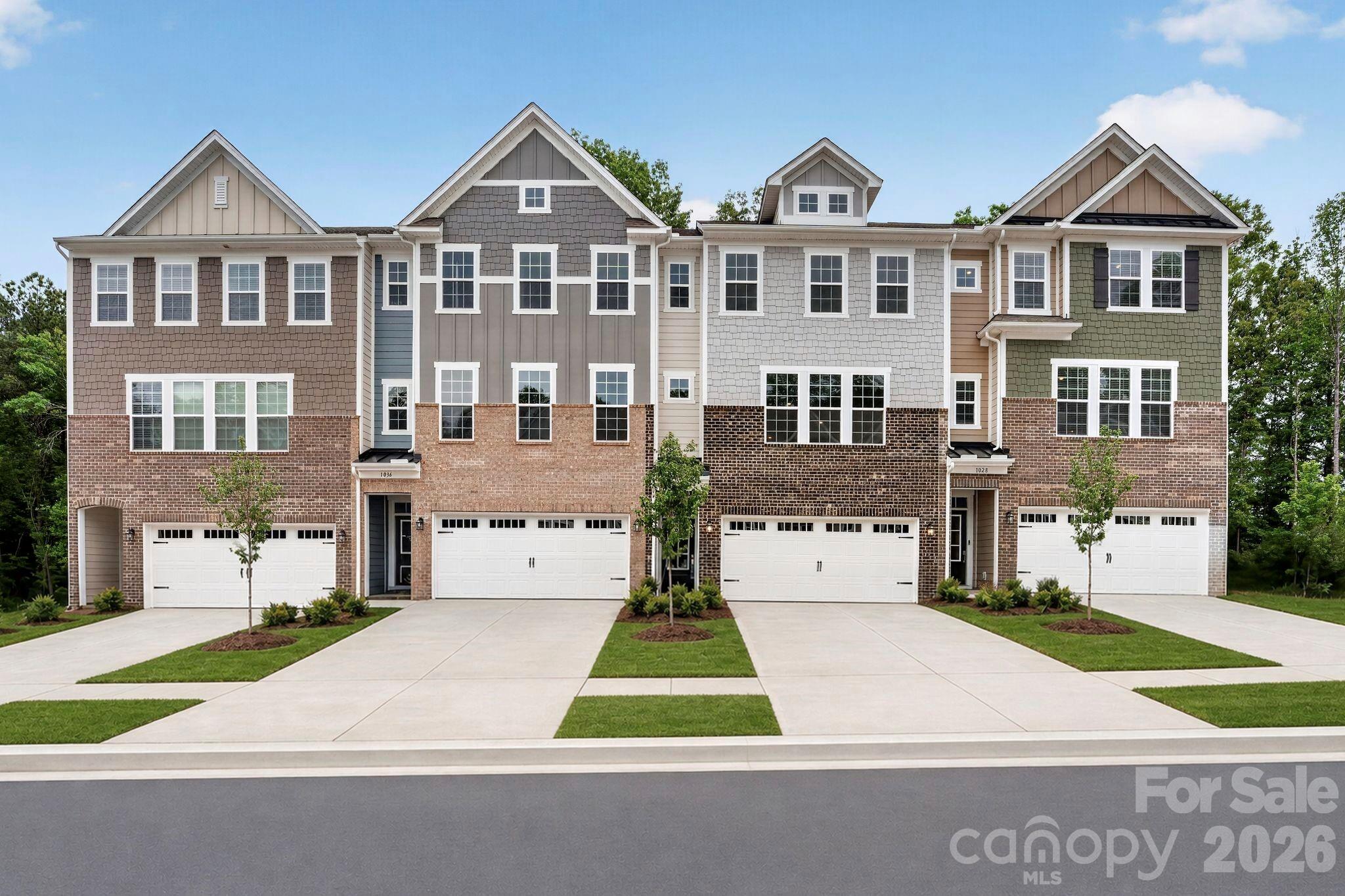 This new three-story townhome is optimized for gracious living. The lower level features a fourth bedroom and two-car garage. Upstairs, an open-plan layout connects the kitchen, breakfast room and family room, with an attached deck for serene indoor-outdoor living. Ideally situated on the top floor are all three bedrooms to provide restful retreats, including the owner’s suite with a private full-sized bathroom. Plus, our signature Everything's Included program means you will get quartz or granite kitchen countertops, stainless steel appliances, luxury vinyl plank flooring, and so much more at no extra cost! Close to downtown Waxhaw, local shops, restaurants, retail and grocery stores. Just a short drive away are Uptown Charlotte and the Promenade at Carolina Reserve shopping center.