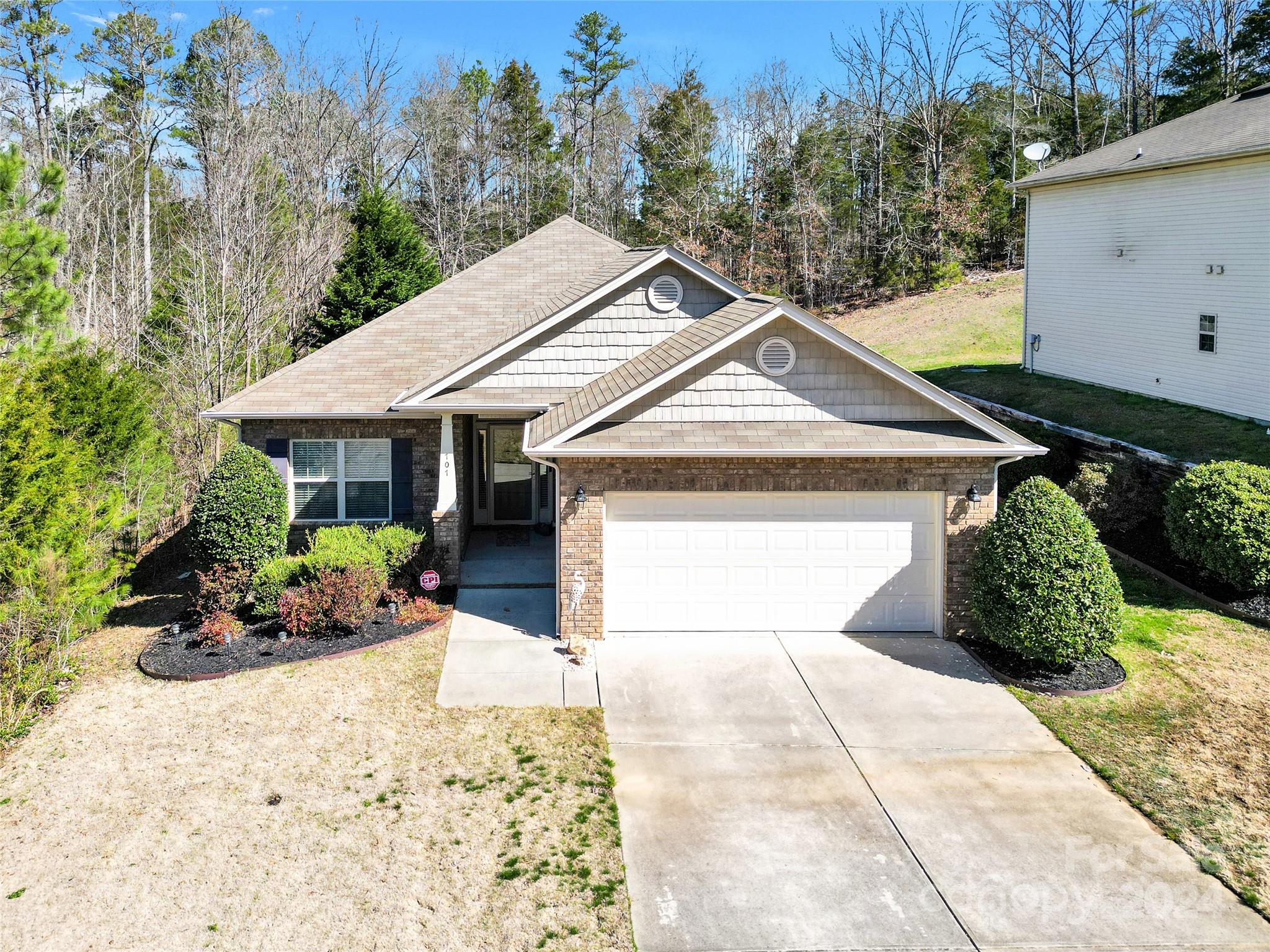 Don't miss this stunning ranch! The minute you walk in you will see this home has been meticulously maintained. You will fall in love with the 14 ft Vaulted ceiling with an incredible Faux wood beam and hardwood floors in every room. Over $40,000 in updates during the pandemic including: 2023 New HVAC with 10 year warranty, New primary bedroom oversized tile shower with frameless glass door and rain shower head, New counter tops fixtures and plumbing in both bathrooms and kitchen, Freshly painted, Hardwood floors added to all bedrooms, Front and back door have Larson security steel frame storm doors, new disposal and sink faucet, New Frigidaire Gallery appliances, New stone back patio, French drains and a dry riverbed, New garage door opener, Security system and more! This lot is surrounded by greenspace. The driveway can park multiple cars for entertaining in the spacious open floor plan. This home is within minutes to 3 public boat launches on Lake Wylie.