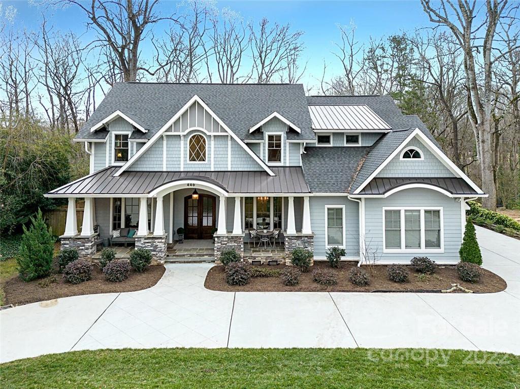 Stunning 6 bedroom, 5 bath home situated on a serene .7 acre lot in the Cotswold neighborhood.  Custom-built in 2016, this light filled home features high ceilings, hardwood floors, beautiful millwork, custom cabinetry, and many designer features throughout. The 1st floor has a study/bedroom w/ full bath, formal dining, open-concept kitchen w/ 10FT marble island, Wolf range, and KitchenAid appliances.  Great Room with coffered ceiling, built-ins, 3 French doors that lead to the covered porch.  Located in the rear hall is a mud room, laundry, powder room, rear staircase, and access to the 1 and 2-car, attached garages. Upstairs features a stunning Primary Suite with vaulted shiplap and beam ceiling, 2 huge walk-in closets, marble bath, and porch overlooking the tiered rear yard and patio.  3 more spacious bedrooms with walk-in closets and ensuite baths, and bonus/ bedroom, office, and 2nd laundry. Featured in a TV commercial and a Hallmark Christmas movie, this home will not disappoint!