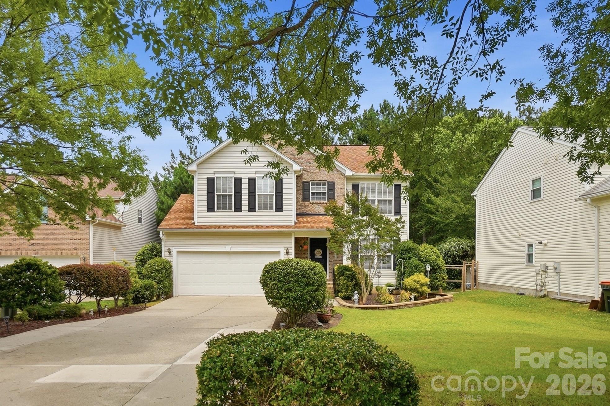 Tucked at the end of a quiet cul-de-sac in one of Tega Cay's established neighborhoods, this home has been cared for with real pride. A pretty kitchen opens to the family room, while the formal dining room is ready for holidays and everyday meals alike. Each area reflecting years of attentive ownership that shows in every room.
Upstairs, four bedrooms give everyone room to spread out, including a small loft that can function as a play area or office nook.
The lot backs to a wooded reserve, giving the backyard a sense of privacy that's hard to find. The deck is the spot for morning coffee or evening downtime, with a view that's quiet, green, and all your own.
Location is the real win here. Tega Cay's trails, parks, pools, marina, golf course, and tennis and pickleball courts are all part of daily life on the peninsula, and this home is within walking distance of much of it. Whether it's a quick walk to the park or an evening on the water, the lifestyle here feels like a vacation that never ends.
Move-in ready and lovingly maintained, this one is ready to welcome its next family.