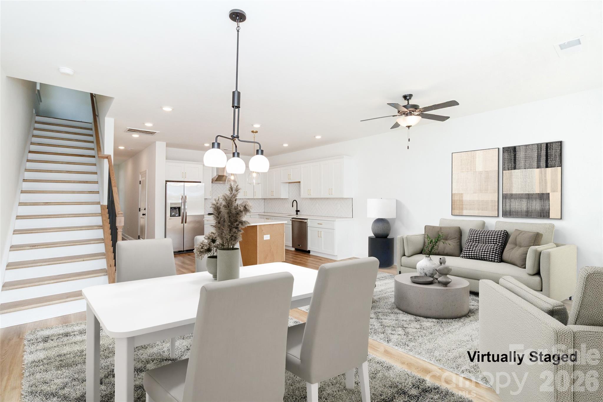 Less than 10 minutes from Uptown, this stunning Enderly Park townhome delivers the perfect blend of luxury, lifestyle, and location. Eligible buyers may qualify for 100% financing with no PMI plus up to $20,000 in lender assistance that can be applied toward closing costs, interest rate buy-downs, or loan amount reduction.

Be one of only four exclusive, design-forward townhomes tucked away on a quiet dead-end stretch of Elon Street — a rare hidden gem offering both privacy and walkable city living. Just moments from Enderly Park’s thriving mix of local restaurants, coffee shops, breweries, and the beloved Front Porch Charlotte community events, this location offers the vibrant energy buyers are searching for.

Inside, sophisticated modern design meets effortless functionality. The open-concept layout creates a seamless flow between the living, dining, and kitchen spaces, making the home feel bright, airy, and ideal for entertaining. The chef-inspired kitchen features a gas range, sleek finishes, and thoughtfully curated details throughout.

Step outside to your own private, fully fenced backyard retreat complete with a gas line hookup — perfect for elevated outdoor dining, weekend gatherings, and relaxing evenings under the Carolina sky. Every space has been designed to feel both refined and comfortable, creating a true sanctuary in the city.

Located in one of Charlotte’s most exciting and rapidly growing neighborhoods, this home offers the rare opportunity to enjoy peaceful residential living while staying moments from Uptown convenience.

Modern. Chic. Effortlessly cool. This is the one buyers will remember.

HLA data taken from builder floor plan information. Buyer agent to verify.