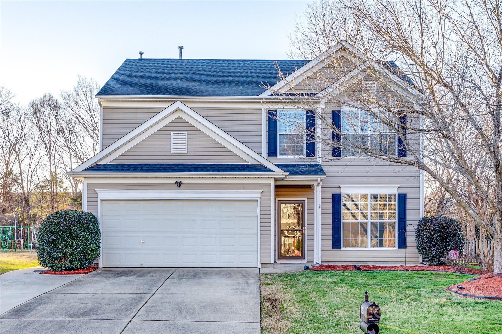 Want to just unpack and relax? Then this one is for you! All NEW flooring throughout the entire home – LVP on the main floor and carpet on the 2nd.  Entire interior has been freshly painted too! Bright & sunny kitchen with granite counters & SS appliances (2018) is open to the living room complete with fireplace and French door access to the large 30' x 10' covered back porch. Fabulous office/study on the main level w/ stylish sliding glass door for privacy. The primary suite has shower, tub, dual vanity as well as a huge walk-in closet. Laundry room is conveniently located upstairs. Nice, fenced corner lot with shed for extra storage. Two car garage as well as additional parking pad w/ walkway to back yard. Rocky River Crossing offers a pool, clubhouse and playground. Very convenient to I-85, I-485, dining, shopping and easy commute to Charlotte. Come discover it today!