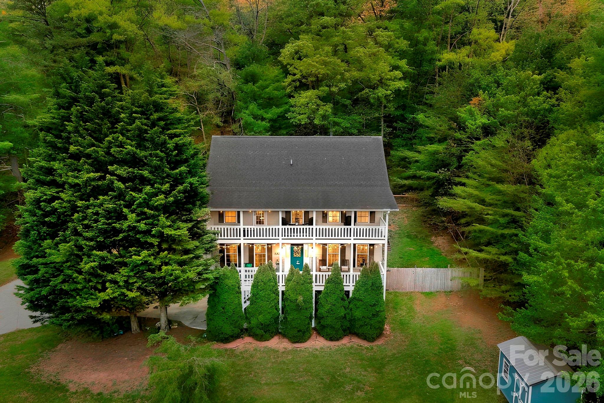 You pull in and immediately notice what’s hard to find these days… easy access, plenty of parking, room to breathe, and a home that feels like it’s been truly cared for.

Set on just over an acre with no HOA and no restrictions, this move-in ready home offers the kind of freedom and flexibility buyers are always hoping to find. Meticulously maintained over the years, it has a pre-listing inspection available upon request, giving added peace of mind from the start.

Inside, the home feels expansive, with multiple floors, large bedrooms, abundant natural light, and a layout that gives everyone space to spread out without losing that comfortable, connected feel. The kitchen is loaded with cabinet space, closets are generous throughout, and every room feels functional and inviting.

The primary suite stands out with its own bonus area that could work beautifully as a nursery, office, hobby room, dressing space, or quiet sitting area. It also offers direct access to a private upper porch, creating a tucked-away retreat feel. The primary bath features tile flooring and a jacuzzi tub, while the upper guest bath also offers tile floors.

Outdoor living is just as appealing, with mountain views from the porches, including two front porches, plus a backyard patio and fenced yard that works perfectly for pups, entertaining, or simply enjoying the outdoors. There’s also convenient access straight into the home and kitchen from the backyard entry, making everyday living feel that much easier.

A huge garage adds even more practicality, and the seller is offering some furniture, making the transition even easier. There are 2 sheds on the property with power to the larger shed. 

Located in Town and Country Estates, this 3 bedroom, 2.5 bathroom home offers approximately 2,466 heated square feet plus additional unfinished space, all in a setting that gives you room, comfort, and flexibility both inside and out.