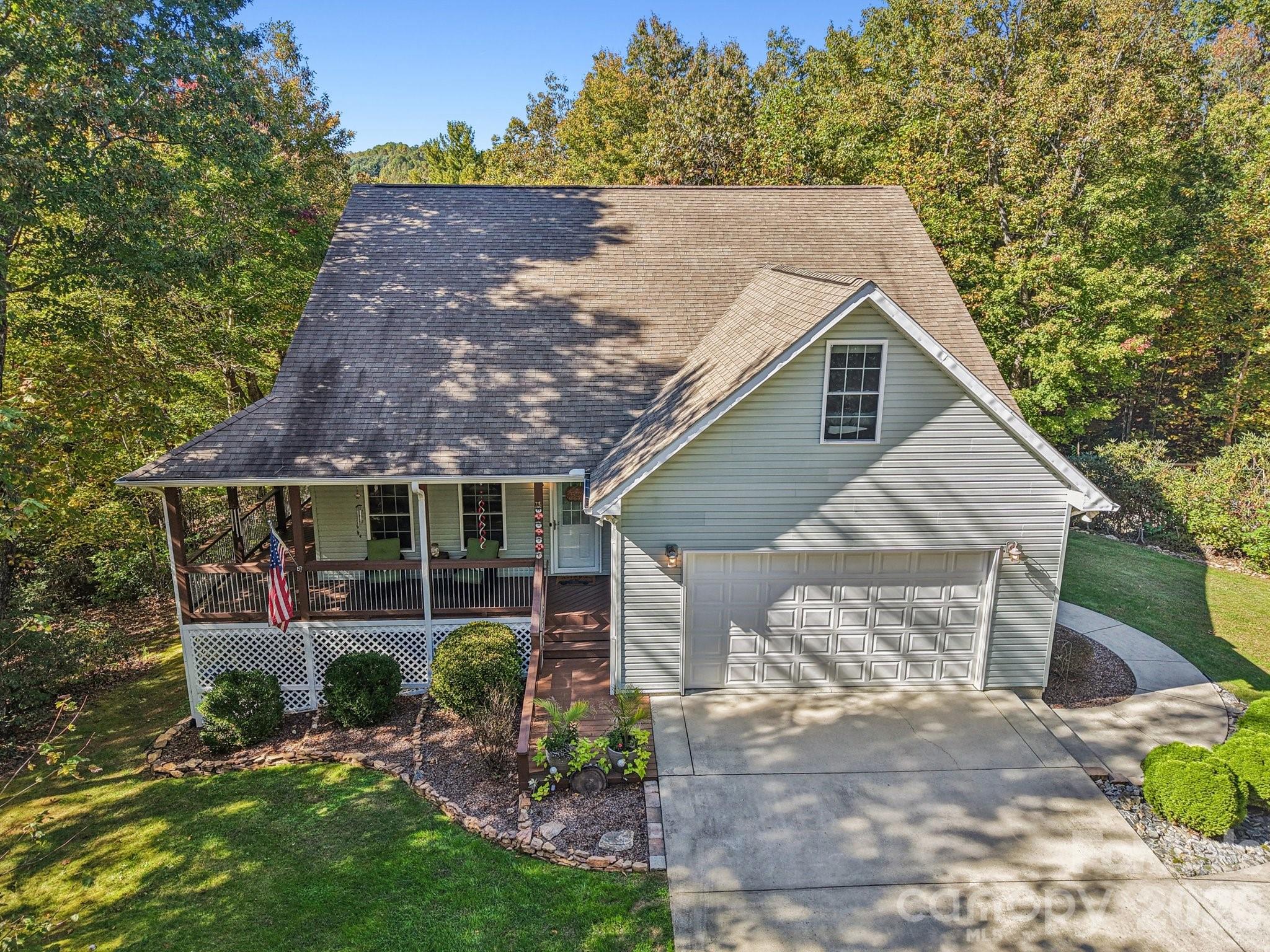 Elegant Flat Rock Retreat with Flexible Living | 4BR, 5BA | 1.49 Acres | $799,900

Tucked at the end of a quiet cul-de-sac, this beautifully appointed 3,814 sq ft home offers space, privacy, and comfort on a 1.49-acre setting just minutes from downtown Hendersonville and historic Flat Rock.

Inside, warm wood floors and thoughtful living spaces create an inviting main level with a spacious family room, well-appointed kitchen, and generous primary ensuite. A second main-level bedroom and full bath add flexibility for guests, work space, or convenient everyday living.

Upstairs offers two additional bedrooms, a full bathroom, and a versatile den that works well as a media room, lounge, playroom, or quiet retreat.

The finished lower level adds exceptional flexibility with a separate kitchen area, comfortable living space, dedicated office area, and two full bathrooms. It’s a strong setup for guest quarters, extended stays, or a private work-from-home space.

An oversized 2-car garage and dedicated workshop area provide excellent storage and room for hobbies or projects.

With generous square footage, multiple living areas, and a peaceful Flat Rock location, this home offers refined mountain living with everyday convenience close by.