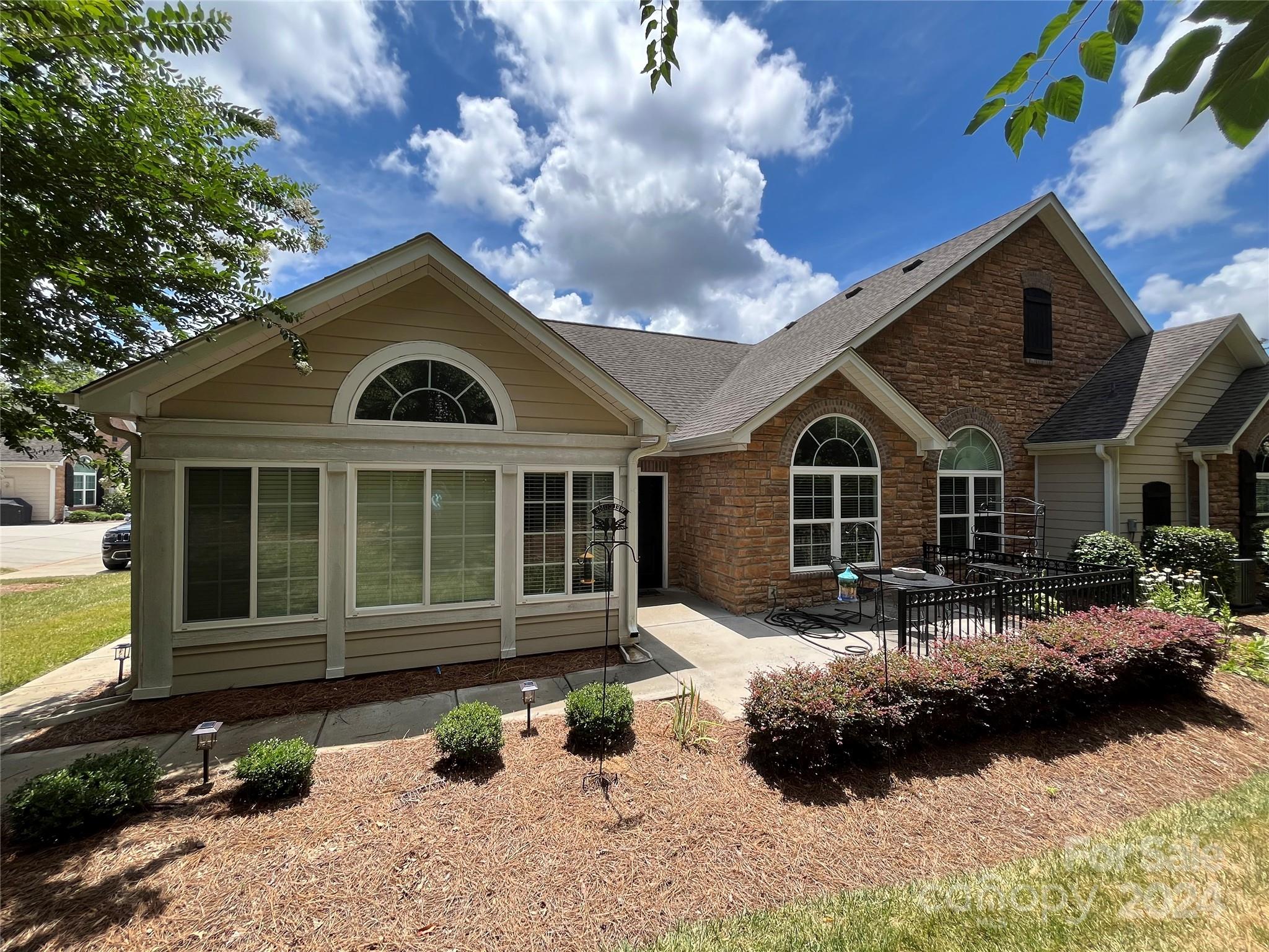 Home is located in 55+ community and features two bedrooms, two full baths with open floor plan. Also kitchen, living room, office and sunroom. Separate laundry room and double attached garage.