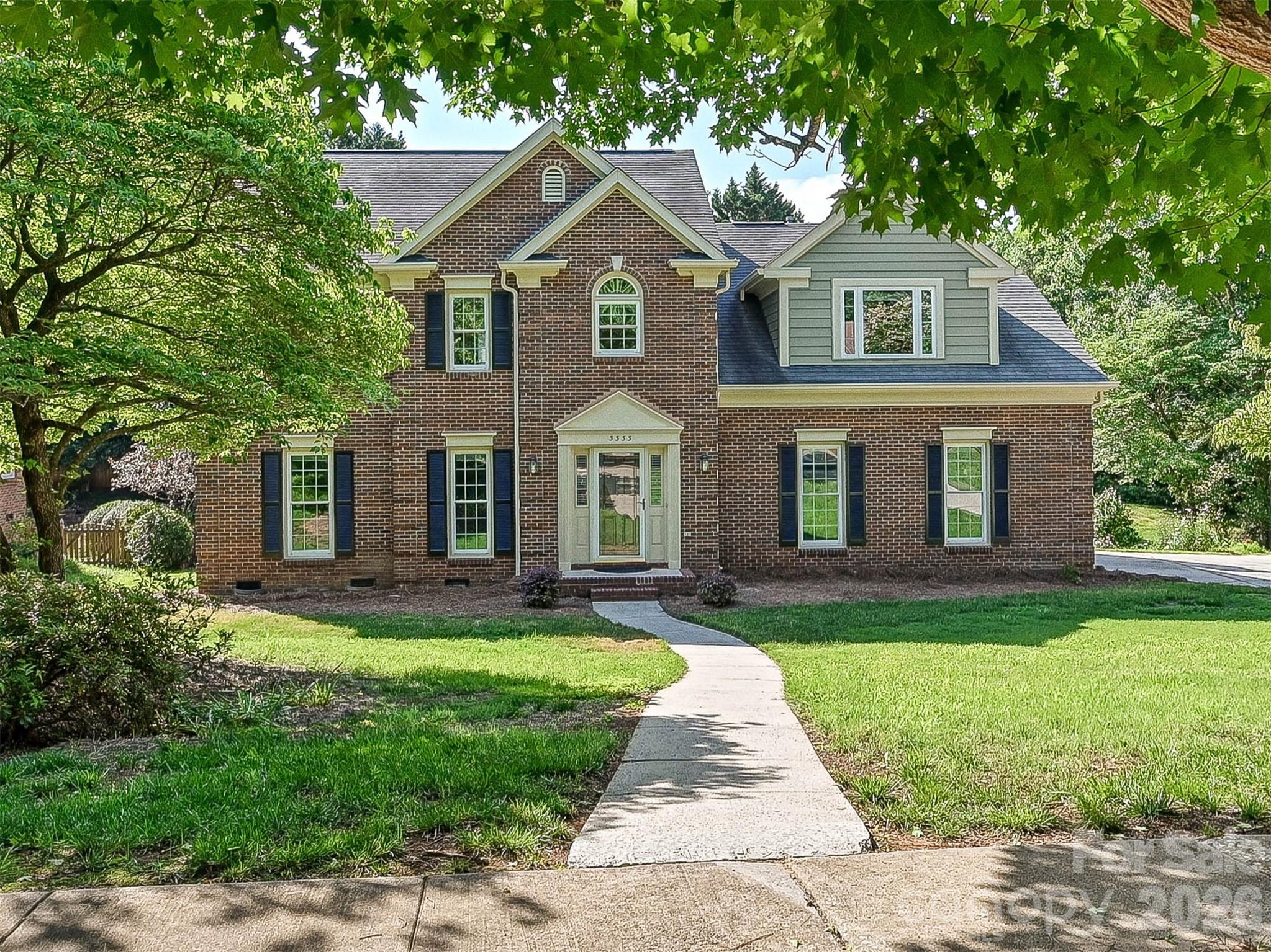 Exceptional home and guest house in beautiful Colvard Park! This home is loaded with updated systems, interior features, multiple outdoor living spaces, oversized garage. Guest House / 2nd Living Quarters provides incredible flexibility. The home's wide entrance Foyer highlights beautiful flooring that flows throughout the 1st floor. The Kitchen features stainless steel appliances, pantry, center island, breakfast nook, open layout to both living areas. Inviting Great Room has vaulted ceiling, beautiful custom built-ins, cozy fireplace & window seat. Elegant entertaining spaces include the open Living Room and Dining Room capped with crown molding. Upstairs, the Primary Bedroom suite has great natural light, renovated spa bath, radiant heat tile floor, dual vanity, walk-in tile shower with bench and rainfall showerhead. Bonus Room/4th Bedroom has walk-in closet, a 2nd closet, and tons of space. Enjoy outdoor living on the relaxing screened porch with window system, a separate covered porch, plus large patio overlooking mature landscaping and direct access to Clarks Creek Greenway. Updates include high efficiency HVAC (2022), Ecobee thermostat, security system, NEW carpet upstairs, NEW paint (exterior trim and most of interior), NEW water heater. Guest House / 2nd Living Quarters offers exceptional flexibility for multi-generational living, private retreat, home office, studio, or rental income potential. Custom built in 2022 with all permits, Guest House has its own sidewalk entrance, covered porch, separate electricity & HVAC. Open layout with 2nd Kitchen, granite countertops, SS appliances, Living Room, light-filled Bedroom with walk-in closet, full bath with curbless tile shower, and its own laundry. All appliances in both dwellings convey. Colvard Park is an etablished neighborhood with tree-lined streets, 2 small parks, neighborhood access to Clarks Creek Greenway. Minutes to 485, UNC Charlotte, hospital, restaurants & shopping. This wonderful brick home and Guest House sit on a half-acre lot in a quiet cul-de-sac. Serene living, minutes from everything, and move-in ready!