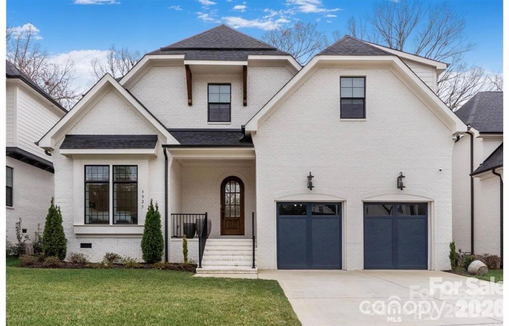 Exceptional new custom home offering over 5,150 heated square feet, including a fully finished lower level, in the heart of Charlotte's coveted SouthPark area. Built by award-winning builder David Simonini, this residence showcases timeless architecture, exquisite craftsmanship, and elegant modern design. Enjoy an open floor plan with soaring ceilings, custom millwork, and designer finishes throughout. The gourmet kitchen features top-of-the-line appliances and flows seamlessly into spacious living and dining areas-perfect for entertaining. The finished lower level provides flexible space ideal for a recreation room, gym or guest suite. This all brick home features the primary bedroom on main floor, dual laundry rooms, a covered terrace, and a study on main as well New construction in Southpark for under $400/sf! Home is currently in Pre-drywall phase, act now to secure your custom options and changes at ease.