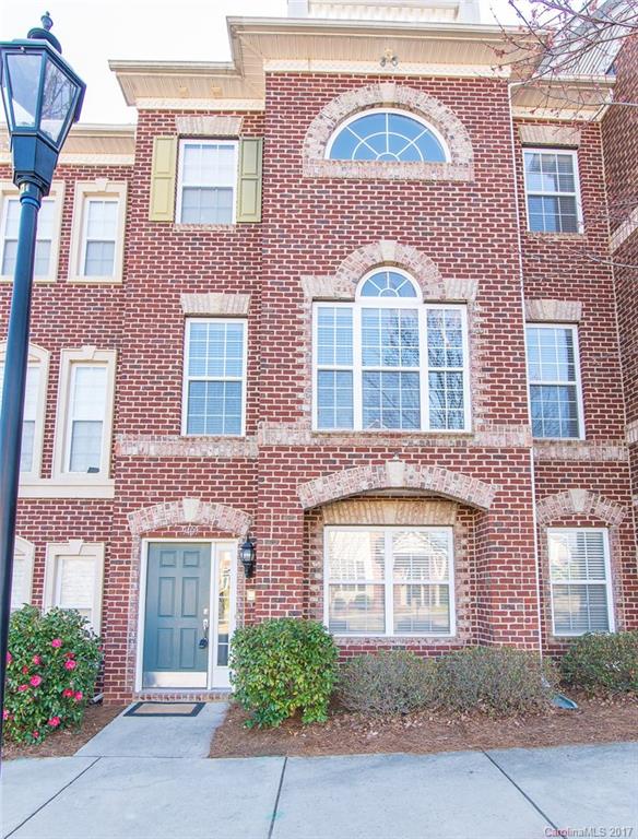 Immaculate townhome. Former model home with all the upgrades INCLUDING an elevator!! Grantite counters, new hardwood floors, epoxy garage floor, gas fireplace, upgraded light fixtures, windows galore!!!, tons of natural light, open concept, crown molding, wainscoting, balcony. Close to dining, shopping, entertainment, and interstate.