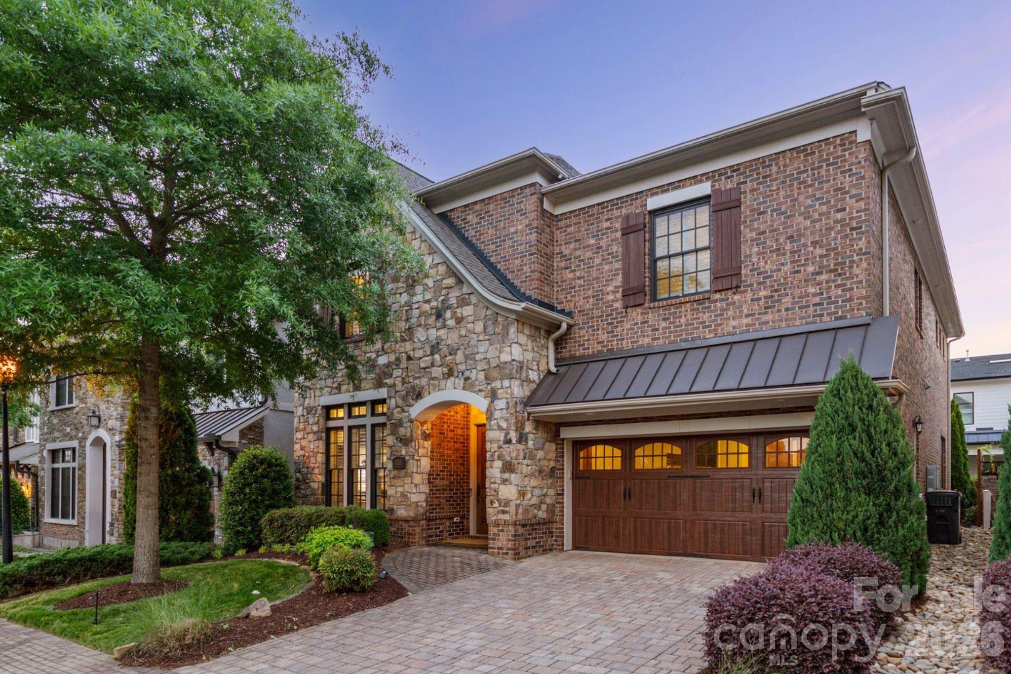 Tucked within Avignon — one of SouthPark’s premier communities — this exceptional property is one of just 15 single-family houses offered in this highly desirable enclave. This home offers timeless elegance, luxury, and effortless living with true lock-and-leave ease. The open, functional layout is filled with natural light and flows seamlessly between the chef’s kitchen, dining area, and great room with fireplace—ideal for both everyday living and entertaining.

The primary suite is a true retreat, featuring a private sitting area with gas fireplace, beverage bar, and access to a private balcony. The spa-like primary bath includes dual vanities and oversized dual walk-in closets.

The second level offers two additional en-suite bedrooms, both with walk-in custom closets, providing comfort and privacy for guests or family. The third floor delivers exceptional flexibility, ideal for a fourth bedroom, home gym, media room, or office.

Wrapped in brick and stone, this thoughtfully designed home is ideal for buyers seeking minimal upkeep with HOA-provided lawn care from front to back. The fully reconstructed private courtyard was designed for both entertaining and relaxation with pavers, custom trellises, irrigation, landscape lighting, water feature, gas fire pit, and lush landscaping.

Don’t miss this home’s notable upgrades including Thermador appliances, site-finished hardwood floors, Bose speakers throughout, central vacuum, custom closets, plantation shutters, custom window treatments, plus an epoxy-finished garage featuring modern storage cabinetry and a built-in workbench. 

Embrace a refined, walkable lifestyle with effortless access to the SouthPark Loop, SouthPark Mall, fine dining, and luxury shopping.
