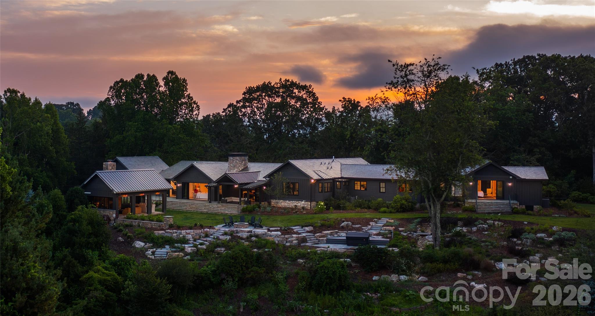Nestled on Town Mountain, this luxurious home stands as a testament to elegance and sophistication. Originally built in 1965, and completely remastered and extended in 2018 using the finest materials and designer finishes. 

The gracious main level offers a billiards room, living room, and dining room, each equipped with Nano Walls to open each space to adjacent stone terraces. The kitchen is fully decked out with Thermador appliances. A study, in law/nanny suite, 4 bedrooms and rejuvenating primary suite round out the main level. Primary suite also features a nano wall, private terrace, vaulted ceilings and spa level bath. The basement offers a wine cellar and media room. Stunning outdoor amenities include a fire pit, hot tub and a cook house with full outdoor kitchen and stone fireplace. Dual Two car garages, generator, smart home.

The epitome of high-end living. With its impeccable design, breathtaking backdrop views, and unparalleled amenities, this home is truly a sanctuary.