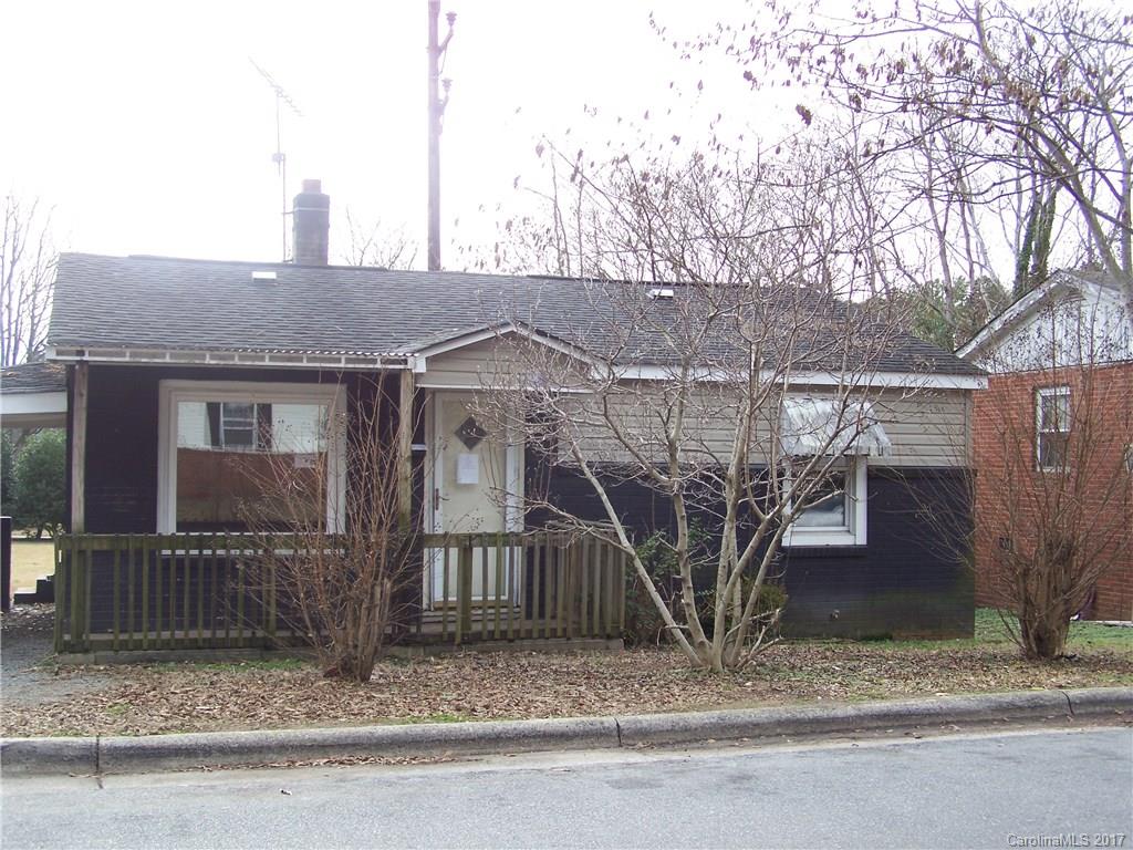 Tons of potential ,Home is located close to shopping and a park,carport 3 bedroom home with an open kitchen family room area