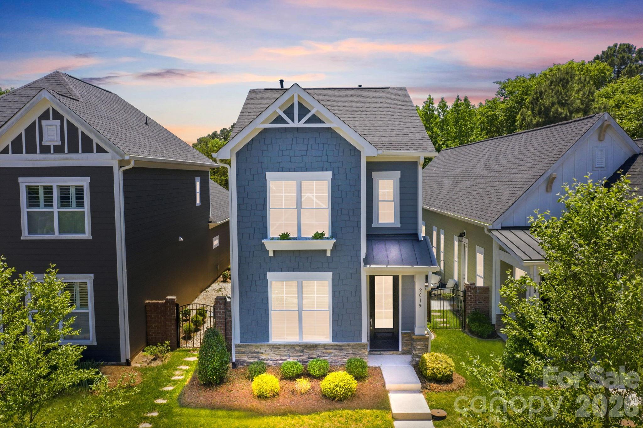 Discover refined living in the highly sought-after Westport Lakeside community. This charming 3-bedroom, 2.5-bath two-story home offers the perfect blend of comfort, style, and functionality. Step inside to an inviting open floor plan highlighted by durable luxury vinyl plank flooring and abundant natural light throughout. The spacious kitchen flows seamlessly into the main living area, creating an ideal space for both everyday living and entertaining. The primary suite provides a relaxing retreat, while upstairs you’ll find two additional bedrooms and a full bath.
Enjoy peaceful mornings or evening gatherings in the charming side yard, offering a quiet and private outdoor setting. Experience resort-style living with exceptional community amenities just a short walk or golf cart ride away, including the Westport Golf Course, clubhouse, pool, fitness center, tennis courts, and pickleball courts. Conveniently located minutes from Lake Norman, top-rated schools, shopping, and dining, this home offers the ultimate lifestyle in an unbeatable location.