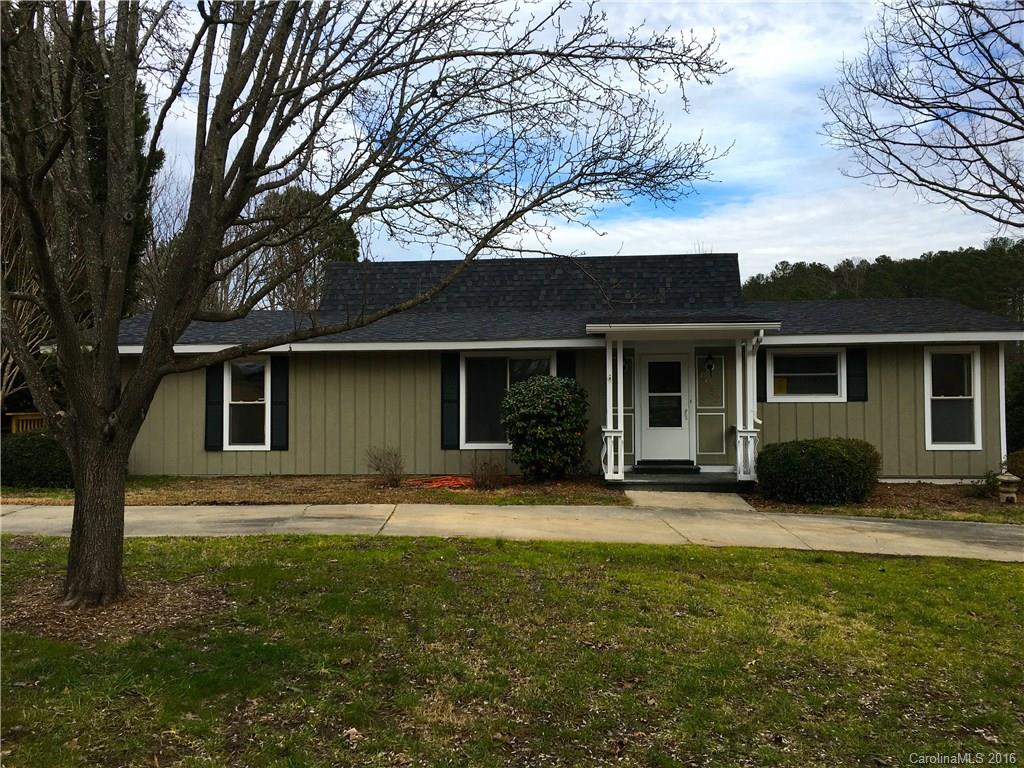 On the golf course in Tega Cay.  Living room, Eat in Kitchen, Sunroom off kitchen, Office has it's own side entrance from driveway and french doors to living room, perfect for a home office.  Mud room with laundry area has ceramic tile.  Three bedrooms & 2 full baths.  Walk in master shower. Third bedroom connects to a playroom/bonus/office. Large new deck overlooking Tega Cay Golf Course. Newly updated. Hardwood flooring, ceramic tile & carpet. Fort Mill School District.  Application fee $30.