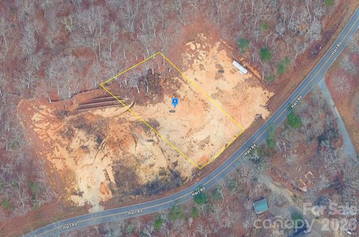 This vacant lot offers an excellent opportunity to build your future home or make a smart investment. Nestled in a tranquil neighborhood, the property features 0.54 acres of rolling terrain. Public water is available, and septic is required. Enjoy a peaceful setting while remaining conveniently located near shopping, dining, schools, and major highways, providing easy access to city amenities. Whether you’re looking for a private retreat, a development opportunity, or a long-term investment, this lot provides the flexibility and location to suit your needs. Listing is for land only and comes As Is.