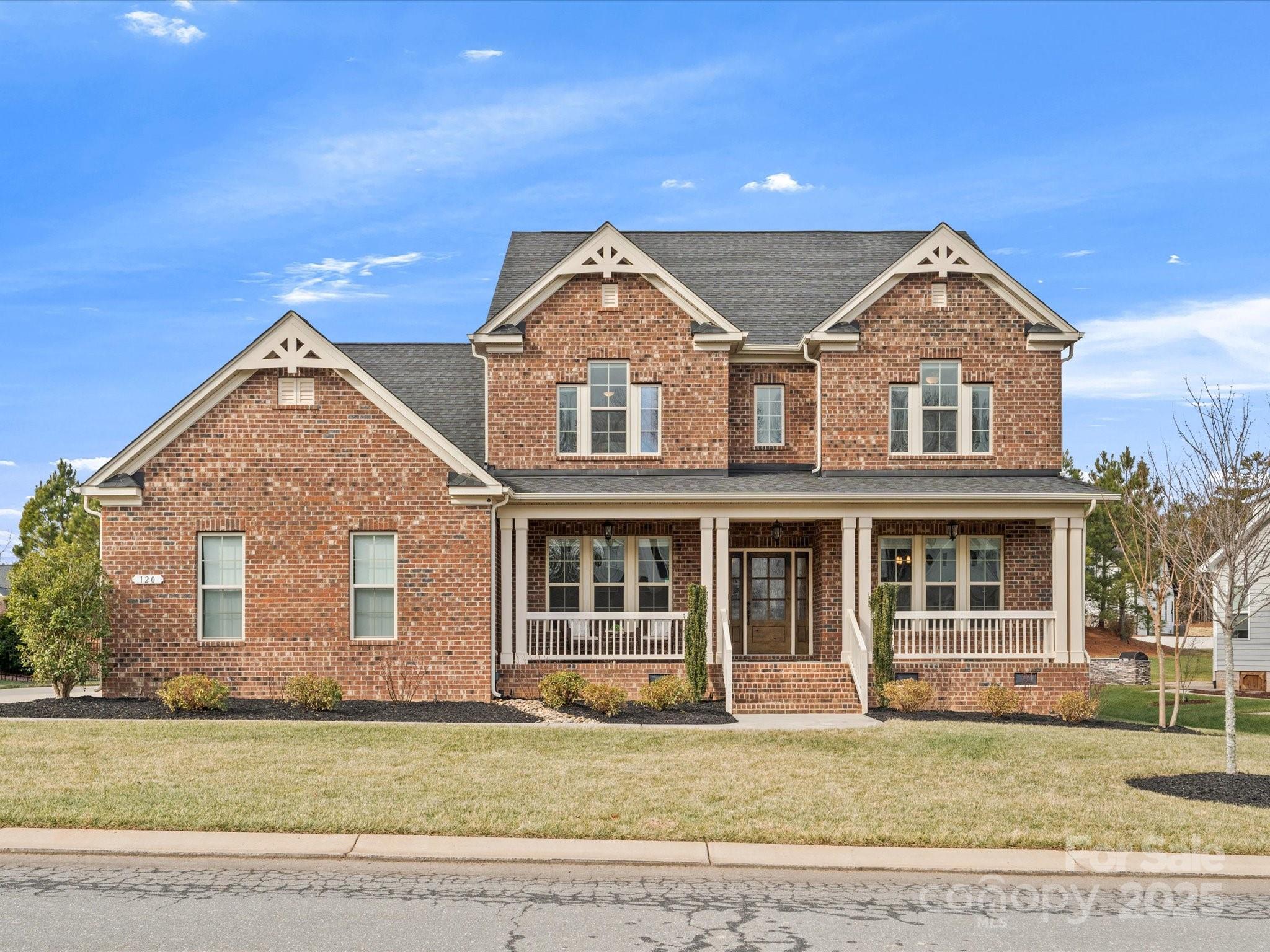 Nestled in the highly sought-after Enclave at Massey, this stunning full brick home offers 5 bedrooms, 4 full baths, and 1 half bath, blending comfort and style with an open-concept design. The main level features a formal dining room, living/office space, and a PRIVATE guest ensuite. Upstairs, enjoy TWO primary bedrooms, each with elegantly appointed bathrooms, and a versatile loft area. The Great Room, complete with custom built-ins and gas fireplace, flows into the chef’s kitchen, showcasing a beautiful tile backsplash, sleek upgraded counters and cabinetry, large center island, soft-close doors, pull-out shelving, walk-in pantry, and a butler’s pantry. Abundant storage throughout with many walk-in closets, convenient drop zone, and 3-car garage. Relax on the front covered porch or the rear screened-in porch, adjacent to an extended concrete patio. Conveniently situated in the exploding 521 corridor and a top-rated school district. Minutes from South Charlotte, Ballantyne, and more.