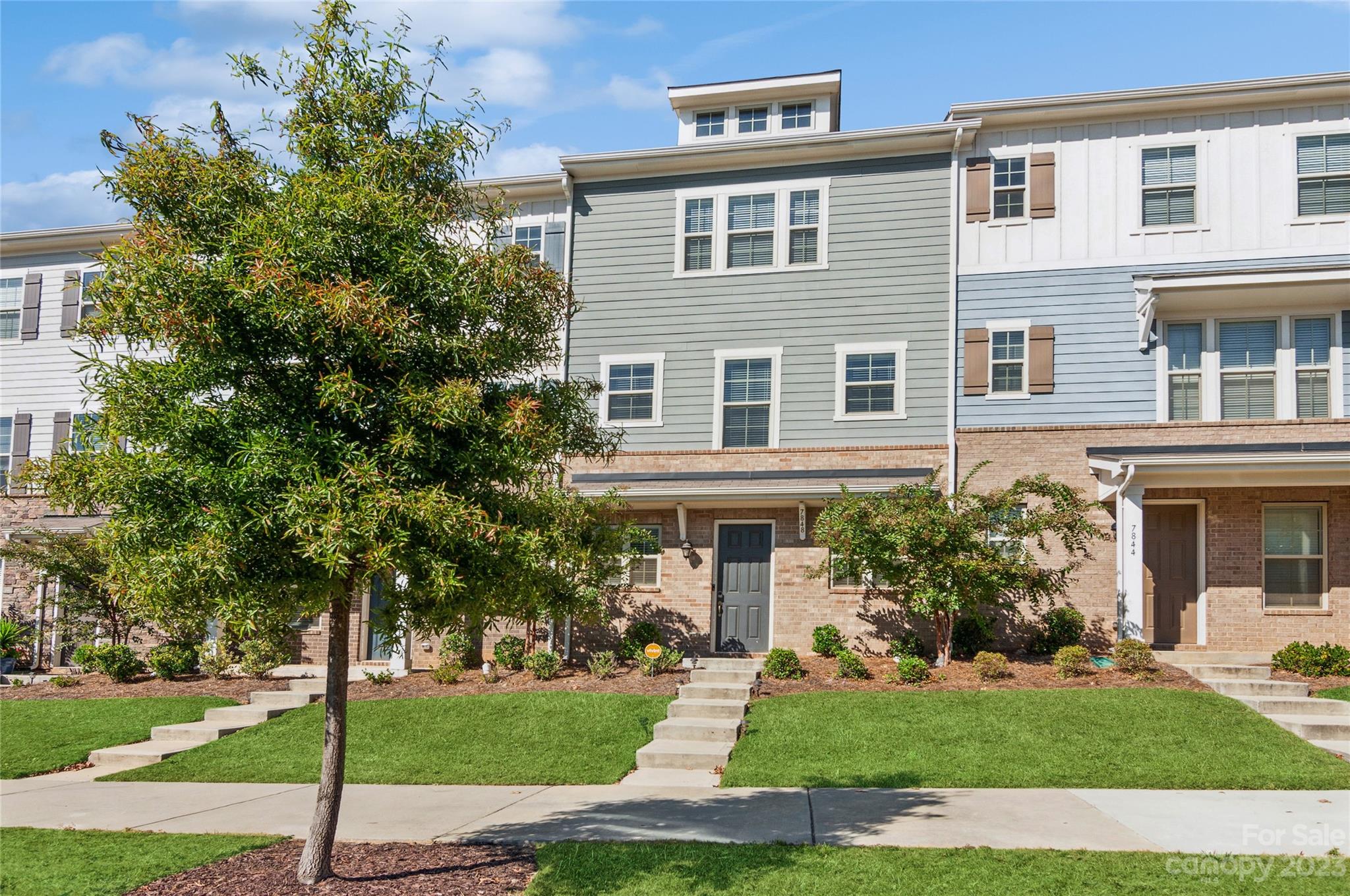 Nestled near South Blvd, this residence offers a perfect blend of convenience, style, and comfort. Natural light pours in through large windows, illuminating the space and highlighting the elegant finishes. The gourmet kitchen boasts a spacious island, sleek countertops , and a gas stove perfect for meal prep and entertaining. The main level deck provides a private outdoor oasis, ideal for a morning coffee. Ascending to the upper levels, you'll find two generously-sized bedrooms, each with its own en-suite bathroom. The master suite features a bathroom with double vanities, and a separate enclosed shower. Convenient laundry closet on the bedroom level for ease of use. With a 2-car attached garage, parking is a breeze, and there's ample storage space for your belongings.