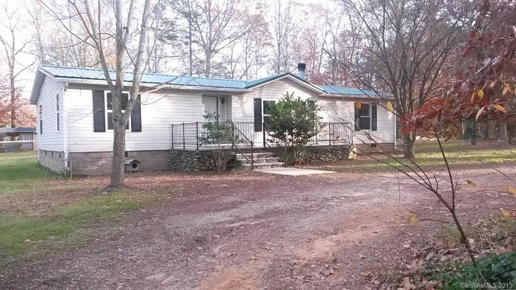 This is a really nice home. Lots of care and upgrades. Brand new metal roof. Really nice built in china cupboards. Huge 16x22 back deck. Small 8x8 storage building, AKA a playhouse. 24x32 foot play area with three and a half foot tall picket fence. Loop drive with woods in the middle that mostly hide the house from the street. Okay, so you might want to change the colors in a couple of rooms.