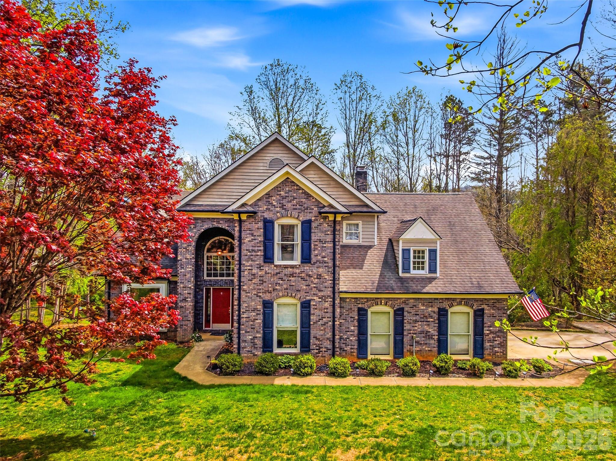 Set on nearly 2 acres in the highly sought-after Franklin Farm community, this 3,600 sq ft home offers a rare combination of space, privacy, and flexibility just minutes from South Asheville.

What truly sets this property apart is the fully finished basement with private entrance and full kitchen—perfect for multigenerational living, guest quarters, or potential short-term rental income.

The main level features a welcoming layout with formal dining, dedicated office, and a cozy den that opens to an elevated deck overlooking wooded surroundings and open space. Upstairs, you’ll find three spacious bedrooms plus a versatile bonus room ideal for a media room, gym, or additional workspace.

Enjoy the best of Western North Carolina living with a large usable yard, mature trees, and room to relax or entertain—something rarely found this close to town.

With a 2-car garage, multiple living areas, and three levels of functional space, this home offers exceptional value for buyers seeking both lifestyle and long-term flexibility.