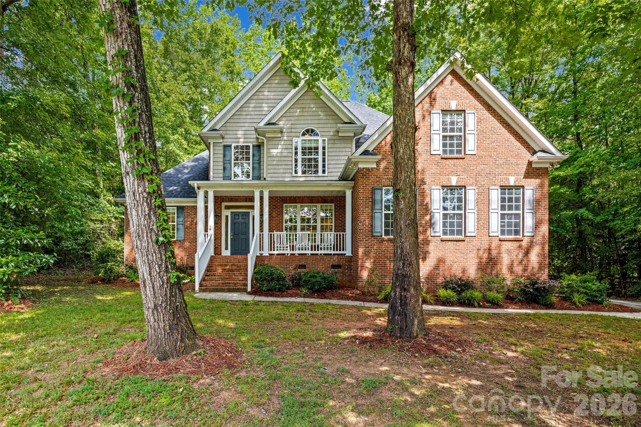 Full Brick custom home in Patrick Place. Private lot on cul-de-sac street. Master bedroom on main level with triple tray ceiling. Master bathroom has whirlpool tub, double vanities & separate shower. Office on main level that can be used as bedroom with full bathroom-perfect for in laws. Kitchen with  cherry cabinets, island & stainless steel appliances. Main floor has beautiful hardwood floors. Spacious 2-story great room with gas fireplace. Two nice sized bedrooms upstairs. Huge bonus room can be 5th bedroom or media/playroom. Back yard backs up to wooded area-very private. New roof June 2026! New upper floor HVAC 2026! Award winning Clover schools. Convenient to shopping & the YMCA.