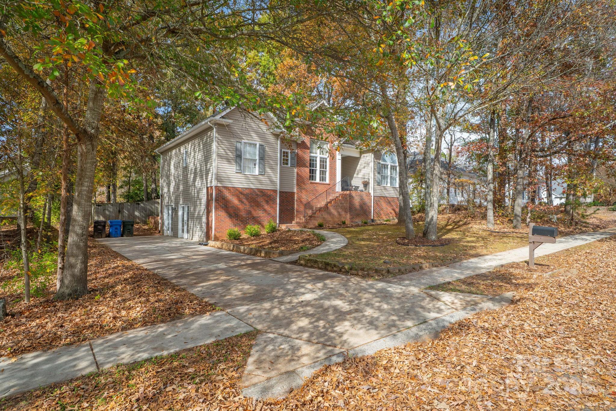 ***Price Improvement***  Beautiful 3-bedroom 2-bath 1-story home with a walk-out fully finished basement.  Located in Stafford Park, an intimate neighborhood of Rock Hill.  This home has been freshly painted, features new flooring upstairs, and boasts a recently finished basement, complete with a new mini—split system and a gas heater. The basement is plumbed for a full bath.  This home is move-in ready! Level wooded lot with a fully fenced-in backyard that is shaded and private. A 316 square foot storage space in the basement for all the Christmas or sports gear.  1121 square foot Basement could be used as a giant office, rec room, sports watching venue, let your imagination run wild.  Upstairs has a split bedroom plan separated by an Open Family room and dining area with vaulted ceilings for family get-togethers.  *** Top it off with a brand-new HVAC System just installed 3/30/2026.*** Homes in this tight-knit neighborhood do not come up for sale very often.  Jump on this one right away. The carpet will be replaced in the secondary bedroom with an accepted offer.