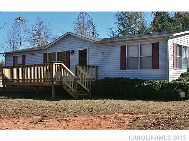 Nice home, recently painted, sits on a corner lot and has beautiful Bradford pear trees. New vanities and sinks in bathrooms. New entrance door. New deck on front and side. Roof replace in 2012. 24'x24' finished, detached garage. Some appliances remain.