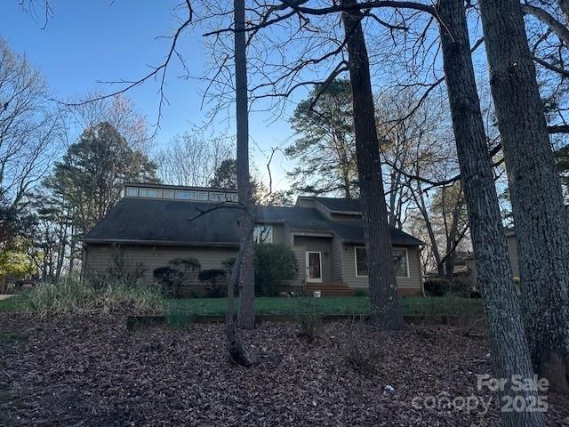 The one has great bones and what a view! On the 18th tee box and overlooking the fairway to the lake. Bring your design ideas and remodel tools.  River Hills is well established country club and waterfront gated community just inside SC and close to Charlotte.
