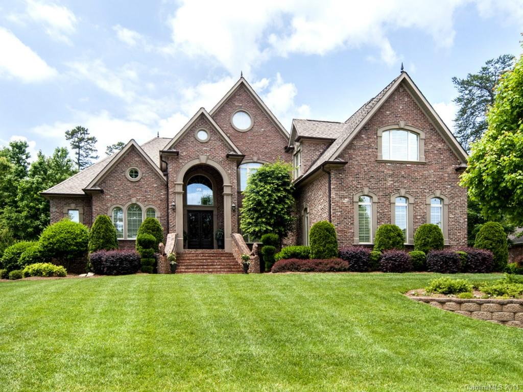 This sophisticated estate home is sure to impress & features only the finest of details throughout including gleaming marble floors in the entry, showcase stairway, gourmet kitchen with Jenn-Air appliances & private library w built-ins. Plantation shutters. The master suite w fireplace, tray ceiling & spa-like bathroom. On the second floor, 3 bedrooms w their own private bath & huge billiard/bonus room. Sitting on nearly an acre w custom landscape. Basement workshop & oversized garage.