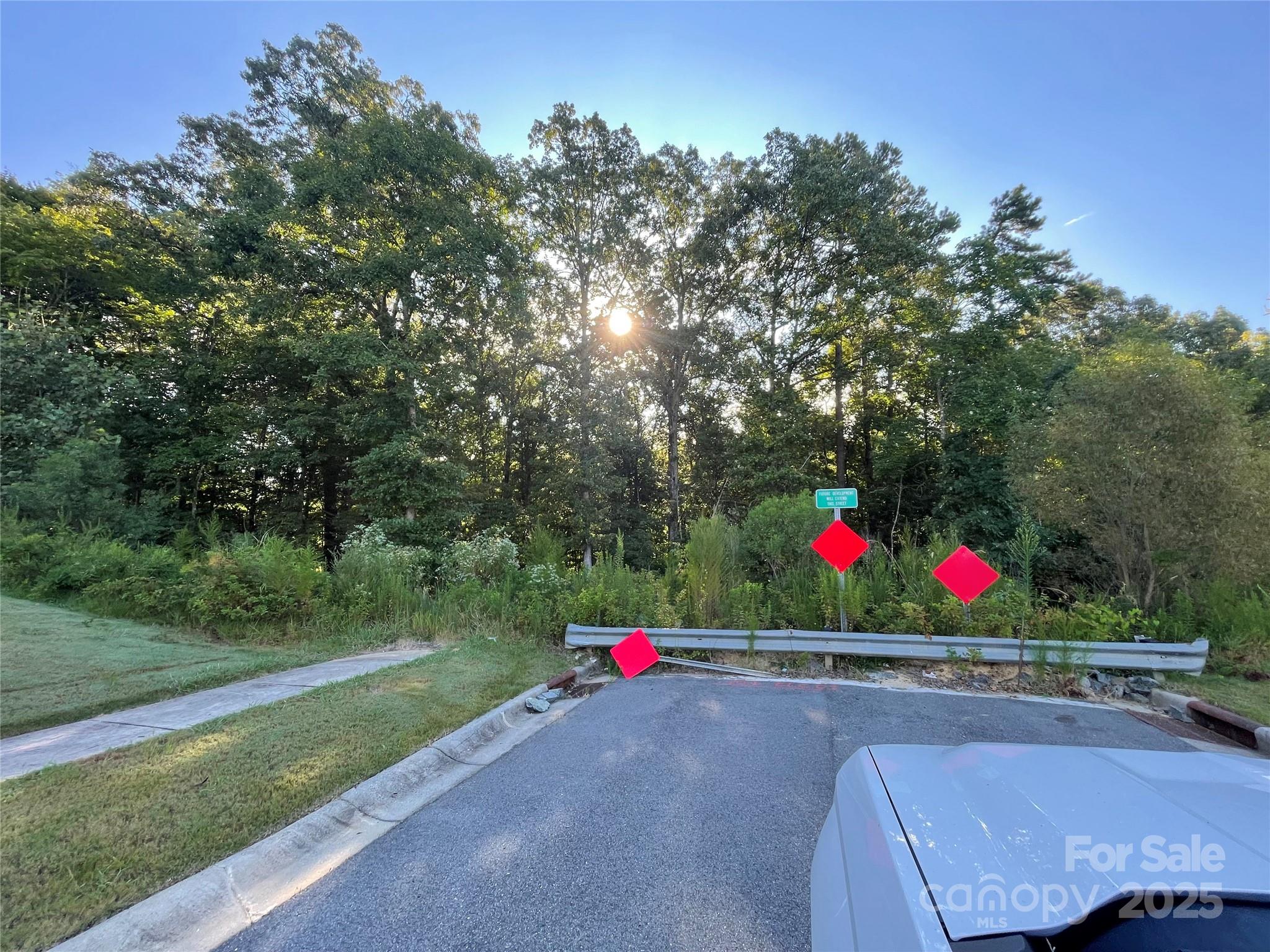 10 acres ready for development, single family homes touching and surrounding land, 
utilities close by as property touches new neighborhood
2 subdivision streets dead end into property
additional 10-15 acres next to property could be assembled
