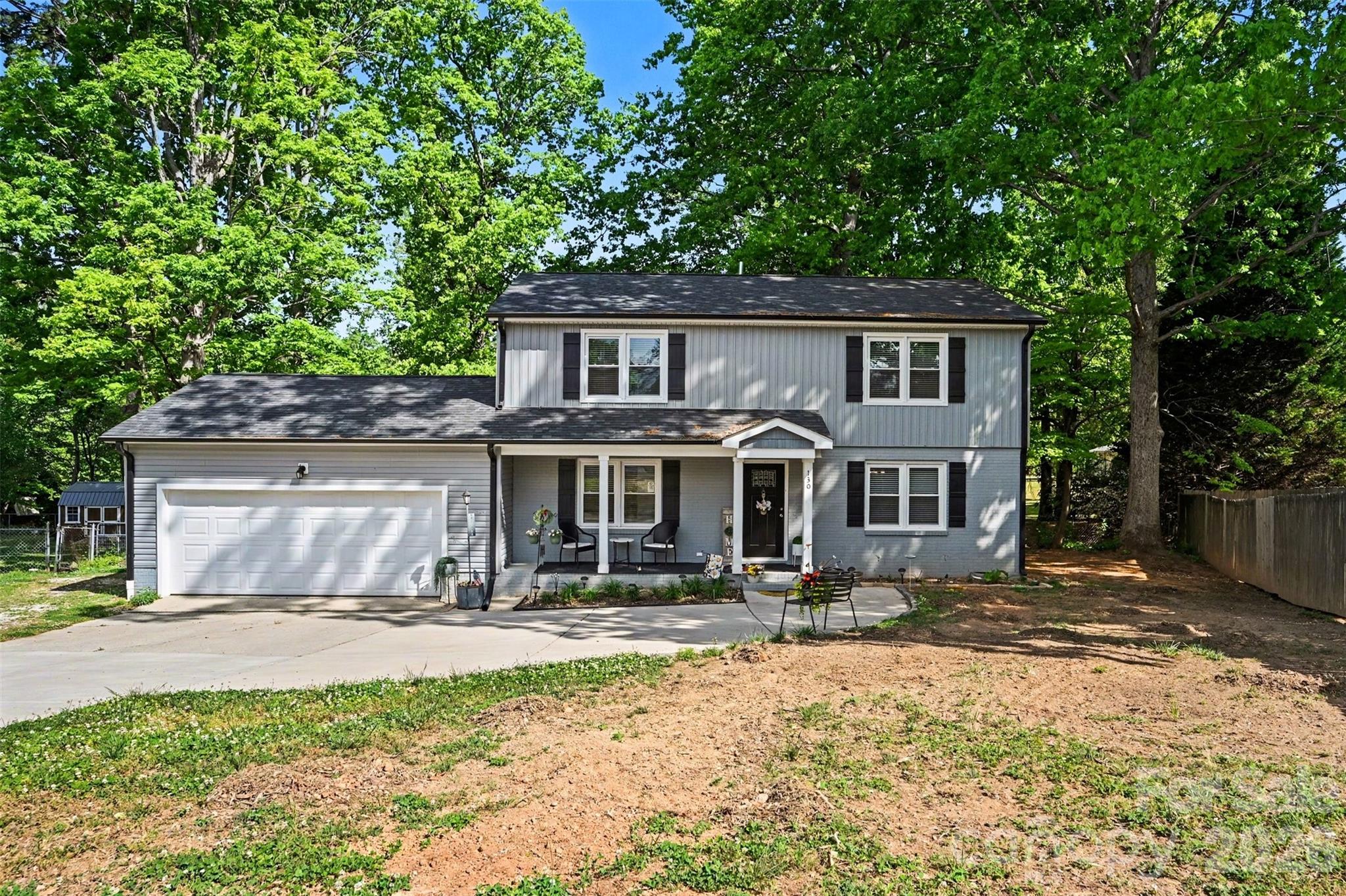 Welcome home to this beautifully updated four-bedroom, three-bath residence in Salisbury, NC on a Cul-De-Sac. Designed for both comfort and entertaining, the open-concept layout flows seamlessly into an inviting eat-in kitchen featuring granite countertops, stainless steel appliances, and plenty of workspace. The washer and dryer convey, adding everyday convenience. The main level offers a private bedroom and full bath—ideal for guests or a home office—along with a conveniently located laundry room. Upstairs, a thoughtfully designed split-bedroom layout provides added privacy, highlighted by a spacious primary suite with a walk-in closet and an oversized, modern en-suite bath. Two additional bedrooms complete the upper level. Outdoor living is just as enjoyable, with both a covered front porch and a rear patio perfect for relaxing or entertaining. Ample parking is available with a two-car garage and an extended driveway. Major updates provide peace of mind, including a new roof and HVAC system in 2021 and a new heat pump installed in 2024 (per seller). This move-in-ready home checks all the boxes—schedule your private showing today.