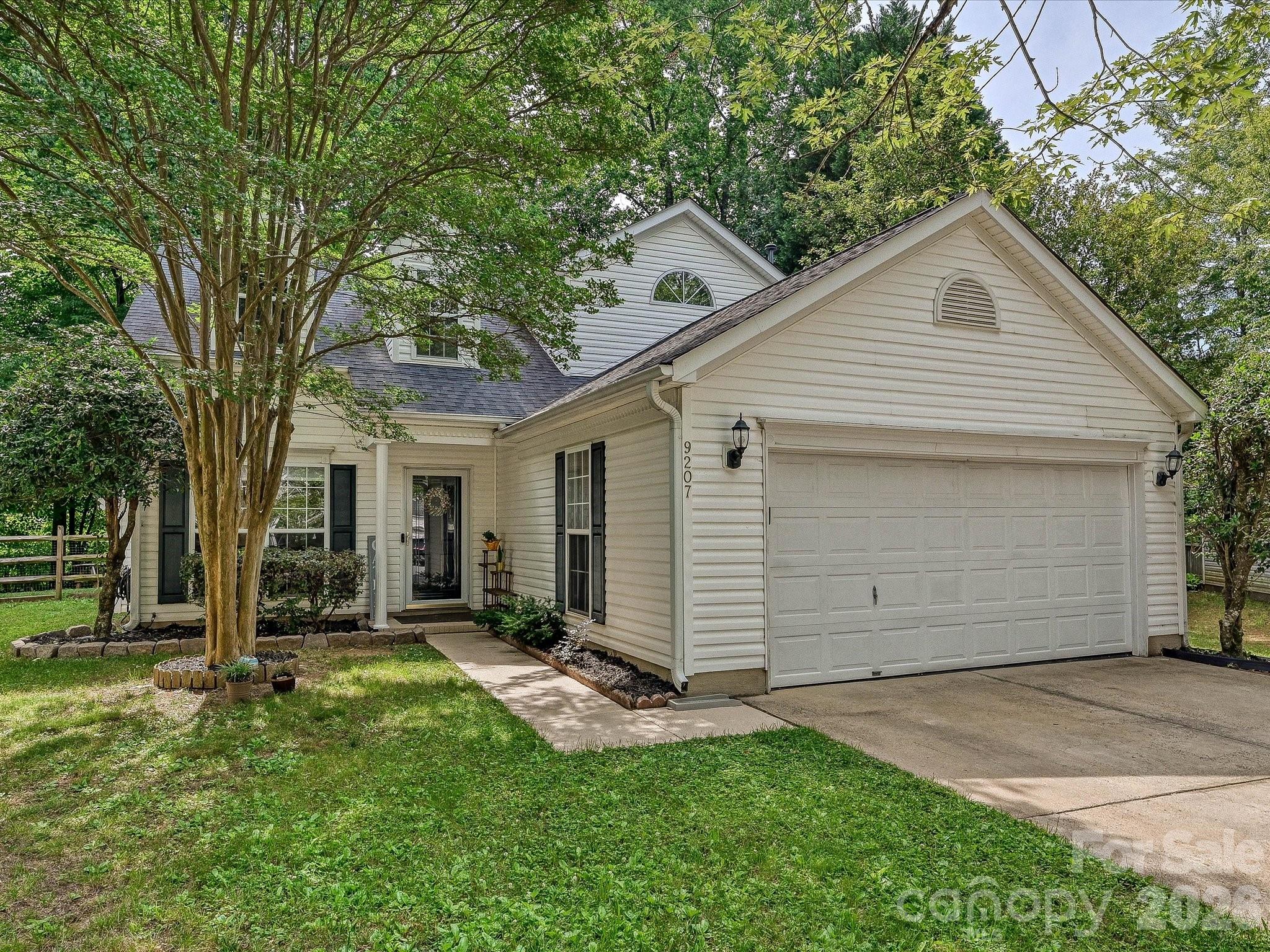 Welcome home to this completely move-in-ready gem in North Charlotte! A rare find at this price point, this beautifully updated 3-bedroom, 2-bathroom home is waiting for its new owners. Step inside to find a freshly painted interior with brand-new flooring throughout—absolutely no carpet! The main level has been thoughtfully modernized with the popcorn ceilings removed for a clean, contemporary feel, and features the ultimate convenience of a primary suite located right on the main floor. Upstairs, you will find a nice-sized loft perfect for a home office, playroom, or flex space, along with two additional bedrooms. Situated on a quiet cul-de-sac lot, the property boasts a large backyard that backs up to mature trees, creating a private and tranquil atmosphere perfect for relaxing or entertaining. Enjoy incredibly quick access to I-485, making commutes and city access a breeze. Come see it, fall in love, and make an offer today!
