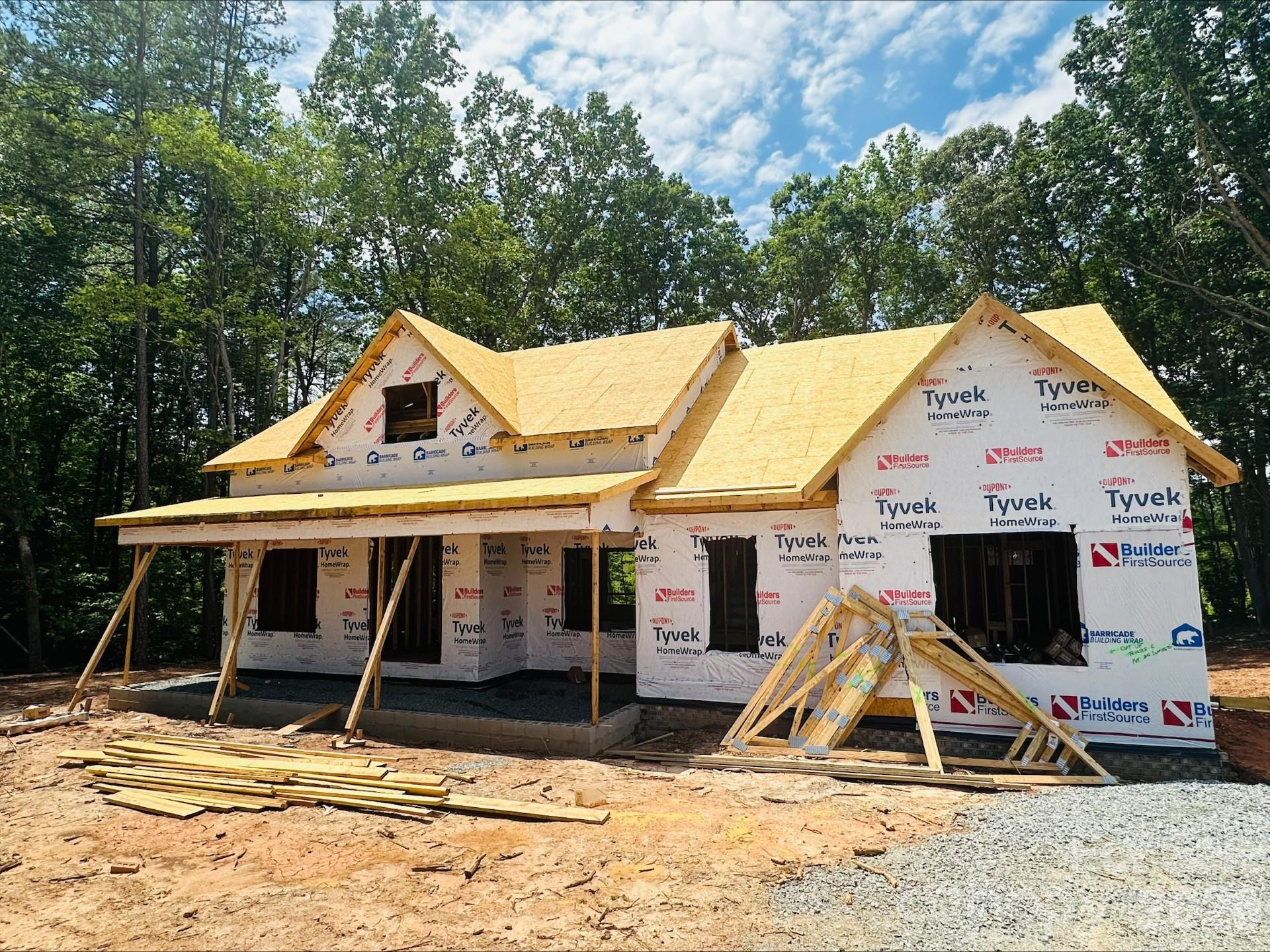 AVAILABLE HOME UNDER CONSTRUCTION. This gorgeous full brick home sitting on almost an acre has all of the bells and whistles of a model home. It includes; site finished hardwoods, an upgraded kitchen with all appliances, a beautiful walk in tile shower in the owner's suite, beautiful crown molding throughout the home and much more. The main level features three bedrooms and two baths including the owner's suite (the secondary bedrooms are on the opposite side of the home giving the owner's suite complete privacy). The kitchen, great room and dining are wide open and great for entertaining. Upstairs has a large bonus suite with a full bathroom and closet. Enjoy your coffee on either the front covered porch or the back covered porch. This home and home-site are all about privacy. This home is one of eleven homes in this boutique community with country feel but only 4 miles away from shopping and restaurants. Give me a call / text to schedule a showing.