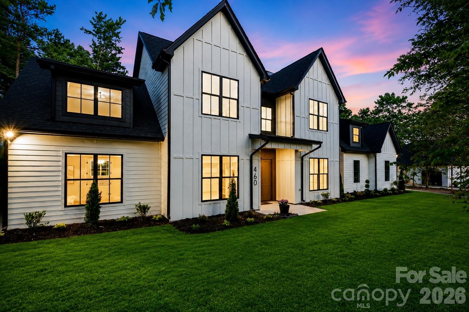 BUILDER OFFERING $100,000 TOWARDS POOL, PRIVACY FENCE & TREES, LENDER INCENTIVES RATES AS LOW AS 2.875% !!! Must-see brand-new home near Lake Wylie offering privacy, space, and modern design just minutes from the water. Located on 1.68 acres in Clover, this new construction home near Lake Wylie features almost 4,000 square feet of living space, perfect for buyers seeking secluded living with easy access to lake life and everyday conveniences. The main level features a spacious primary suite and an open-concept living area with soaring ceilings and a dramatic open balcony overlook, creating a bright and elegant atmosphere. A striking wall of oversized windows rises along the living room, following the height of the ceiling and filling the space with natural light while enhancing the home’s grand, open feel. The kitchen flows seamlessly into both a formal dining room and a breakfast area, ideal for entertaining and everyday living. Upstairs offers a dedicated office, two bedrooms with impressive vaulted ceilings, an additional bedroom, and a versatile bonus room perfect for a media room, playroom, or flex space. Enjoy the best of new construction homes near Lake Wylie with less than a 10 minute drive to Papa Doc's Shore Club, Morningstar Marinas, River Hills Country Club, and Seven Oaks Nature Preserve. Convenient access to Publix, Lowe's Home Improvement, boat rentals, waterfront dining, and entertainment makes this location highly desirable. If you are searching for a brand new home with acreage near Lake Wylie, this property offers the perfect balance of South Carolina privacy with close proximity to North Carolina amenities and everything Lake Wylie has to offer.