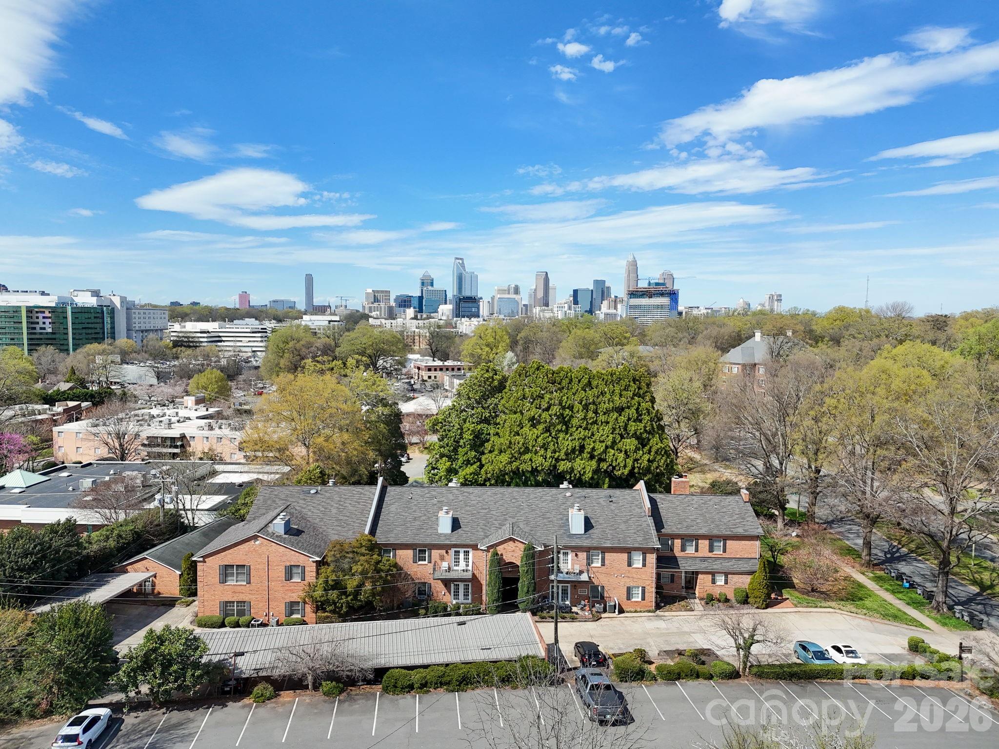 Incredible Myers Park location that can’t be beat! Situated across Queens Road from picturesque Edgehill Park, this spacious main-level condo is the largest floor plan in the complex and offers 3 bedrooms and 2.5 bathrooms with no stairs. Located at the back of the complex, the unit provides added privacy and a peaceful setting. As an end unit, the home is filled with natural light throughout.

The updated kitchen features granite countertops, stainless steel appliances, and abundant cabinet space, and opens seamlessly to the dining area and inviting family room. The living space is highlighted by a wood-burning fireplace, a beautiful bay window, and an updated powder room for guests.

The primary suite is generously sized and features a walk-in closet, ensuite bathroom, and a private exterior door leading to the covered patio. Two additional bedrooms share a Jack-and-Jill bathroom with dual vanities. Additional highlights include an in-unit laundry room and a separate owner storage room located in the rear building.

Enjoy an unbeatable walkable lifestyle near Edgehill Park, Freedom Park, the Little Sugar Creek Greenway, plus countless restaurants, shops, and more. Don’t miss this opportunity to live in one of Charlotte’s most desirable neighborhoods.