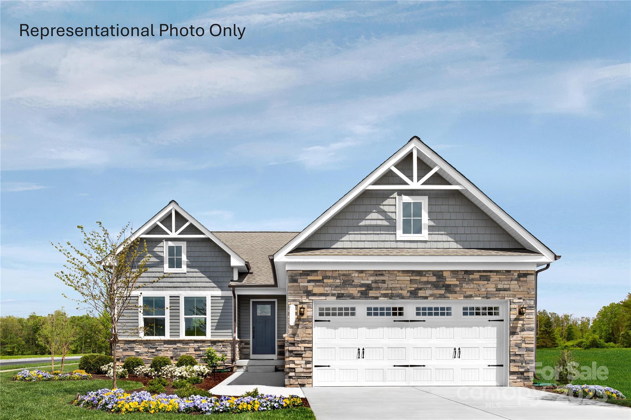 Laney Farms offers modern new construction living in Pageland, where residents enjoy a quieter residential environment with convenient access to regional destinations. Situated near Highway 601, the community allows for easy travel to Monroe, Waxhaw, and surrounding areas while remaining close to everyday shopping, dining, and services. Planned amenities such as pickleball courts, a dog park, and community gathering areas add long-term lifestyle value. The Eden Cay floorplan is designed to maximize space and functionality with all living areas on one level. The expansive open layout offers generous room sizes, excellent natural light, and ample storage throughout. The kitchen opens directly to the main living area, making it ideal for entertaining or casual daily living. The primary suite includes a large walk-in closet and private bath, creating a comfortable and private retreat. Buyers may receive closing cost assistance when using the preferred lender, helping make homeownership more accessible. Schedule your visit today to learn more about Laney Farms and explore available homes.