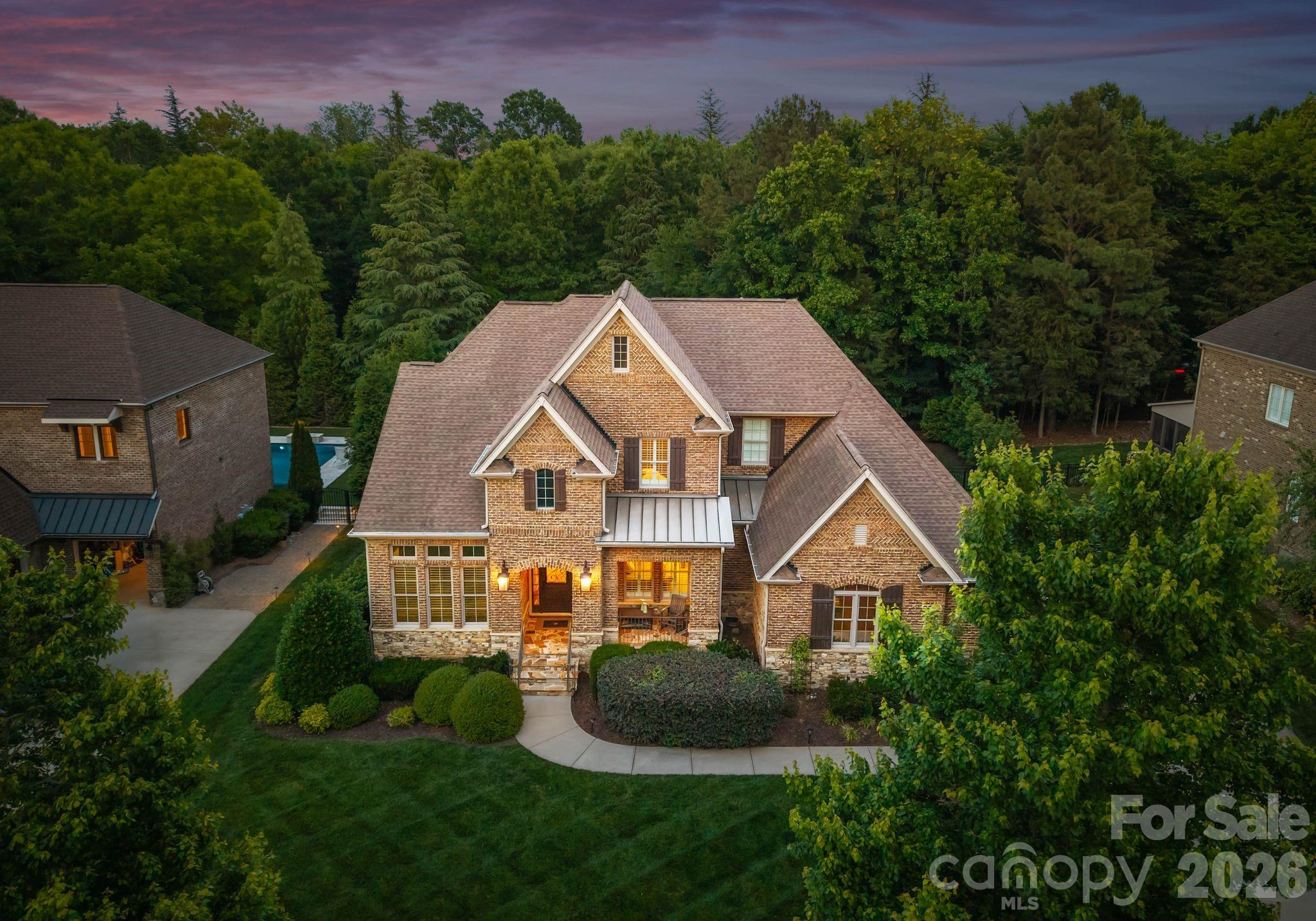 Coming Soon, showings begin Thursday June 4th.  Nestled within the prestigious gated community of The Club at Longview, this beautiful newer home, 2015, features a thoughtfully crafted open floor plan with a desirable combination of a luxurious primary suite and private guest suite on the main level.  First floor office makes working from home convenient. 
The soaring two-story great room with fireplace creates a dramatic and inviting centerpiece, flowing seamlessly into the chef’s kitchen, breakfast/dining area and sun-drenched sunroom. The spacious primary retreat is a true sanctuary, complete with an oversized walk-in closet and direct access to the laundry room for ultimate convenience. Upstairs, you’ll find three generously sized secondary bedrooms and a versatile bonus room perfect for movie nights, a playroom, or home gym.
The expansive covered porch with outdoor fireplace extends the entertaining space and overlooks a spacious patio and beautifully landscaped fenced backyard designed for year-round enjoyment. 

Residents enjoy access to the exceptional lifestyle offered by The Club at Longview, featuring a Jack Nicklaus signature golf course, elegant clubhouse dining, resort-style pools, fitness center, tennis, and playground amenities. Social membership required.