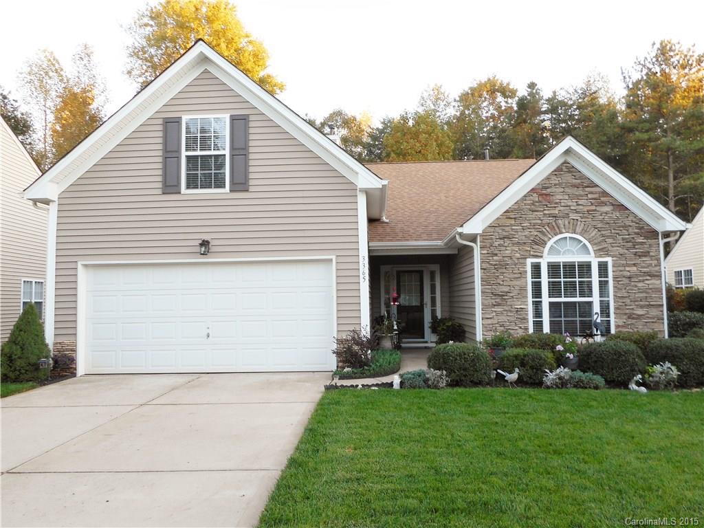 This house has it all. Curb appeal with the Stone accent on front. Great Room concept, Gas Logs, Vaulted Ceilings in most rooms, Entry Hall, Large Master Bedroom with Sitting Area,  4th Bedroom/Bonus, Split floor Plan, Laminate Flooring Downstairs, Porch on Back and a Wonderful Fenced Back Yard with Trees. The Open Floor Plan makes this home feel warm and inviting. The Back Porch is Private and a Relaxing place to sit and look out upon the trees.