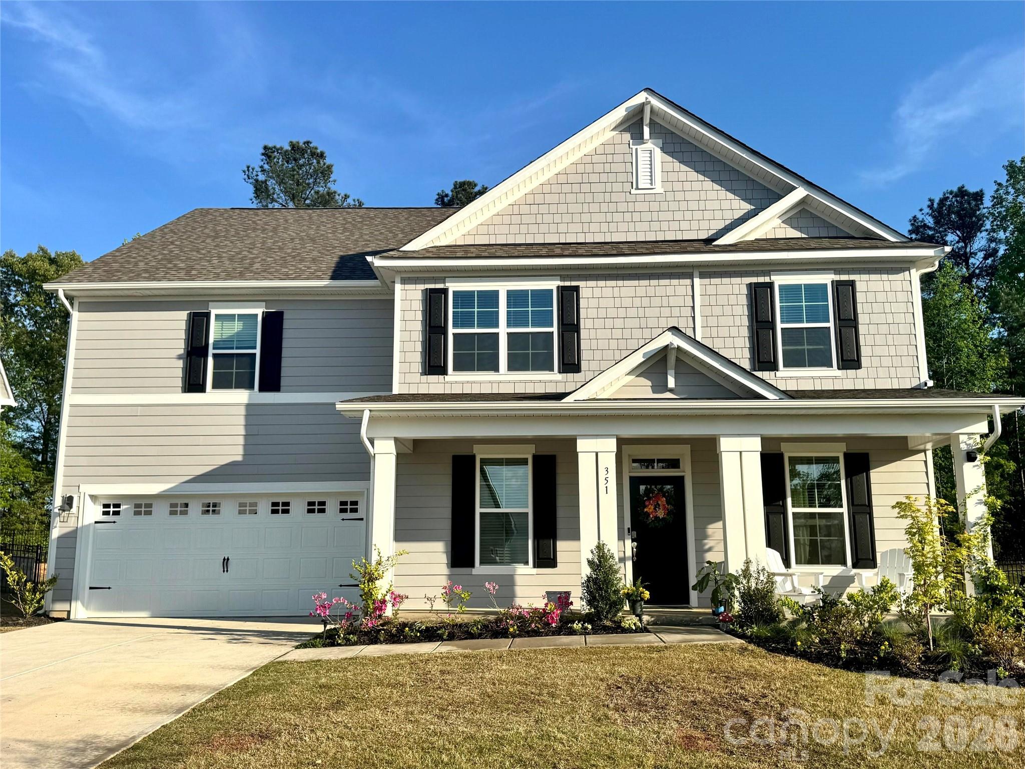2021 CLUB CAR ONWARD INCLUDED

MOVE-IN READY upgraded Tillery model priced to sell in Westport! Why wait for new construction when this beautifully upgraded 5 bed, 4 bath home can close ASAP? Situated on a premium wooded lot with private backyard, this home features custom built-ins, upgraded lighting, 7” LVP flooring, chef’s kitchen with quartz countertops, large island & double wall ovens, outdoor fireplace with paver patio, Frigidaire Professional refrigerator, Electrolux washer/dryer, and custom wooden swingset. Zoned for NEW Clover schools: Liberty Hill Elementary & Lake Wylie High. Future Westport amenities include pool, fitness center, pickleball courts, walking trails, game room & amenity center.