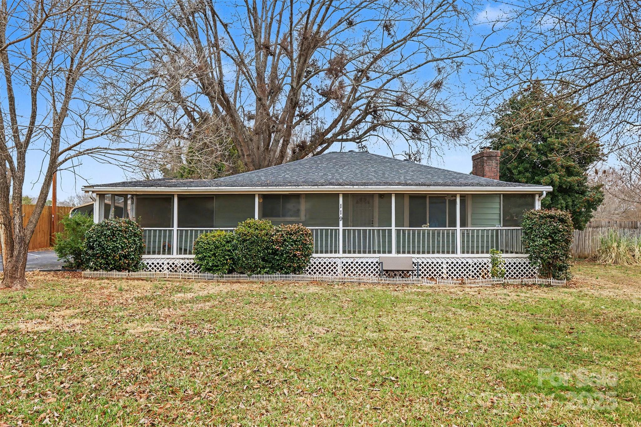 Move-in ready 3BR/1BA home in Gastonia featuring a welcoming screened front porch and a cozy wood-burning fireplace. The property offers excellent functionality with a wired garage/workshop equipped with a window A/C unit, plus ample parking via a carport and extended driveway. Major updates include a new private well pump (January 2025), A/C ductwork replacement (May 2023), and plumbing updated to PVC throughout. The crawlspace is partially encapsulated with a 6-mil vapor barrier installed. Enjoy the fully fenced backyard designed for both everyday living and entertaining, complete with a wired gazebo, raised garden beds, fire pit, and an in-ground pool (currently drained and sold as-is).