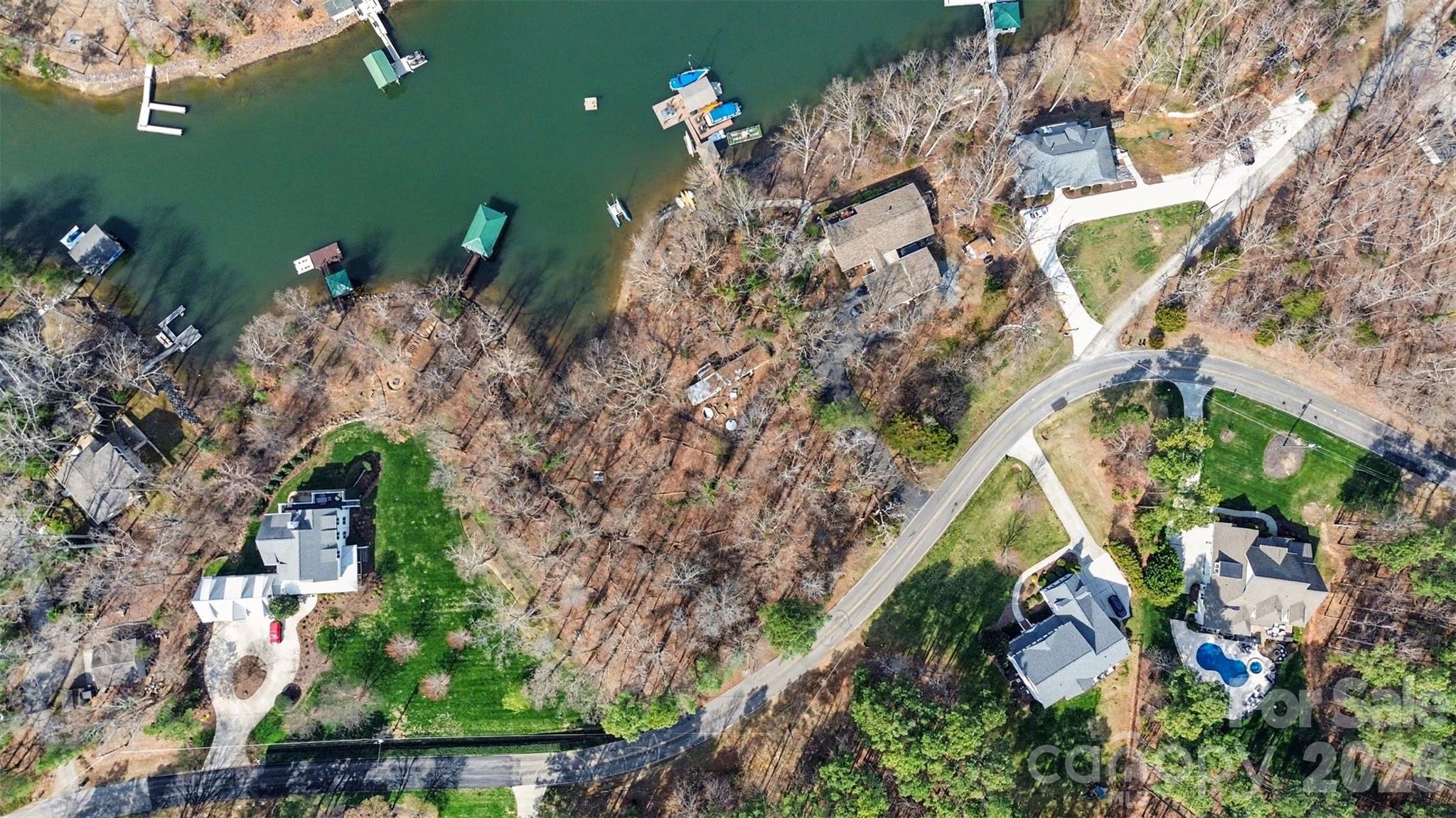 Rare opportunity to build your custom dream home on Lake Norman with no HOA. This beautiful 0.88-acre waterfront lot is gently sloped and tucked away in a peaceful deep-water cove with easy access to the main channel, offering the perfect setting for lakefront living. A prior dock permit approved by Duke Energy. Ideally located off Brawley Peninsula, just outside of The Farms and near The Point, you’ll enjoy convenient access to dining, shopping, golf, and entertainment. Build the lake home you’ve always envisioned and start enjoying everything Lake Norman living has to offer.