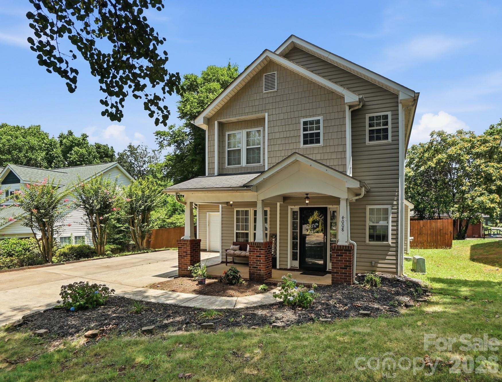Charming two-story home that is move-in ready! This inviting home welcomes you with a covered front porch, perfect for relaxing and enjoying your morning coffee. Inside, you'll find beautiful floors throughout the main level, a spacious family room with a gas log fireplace, dining room and 1st floor laundry room.  Step outside to your own backyard retreat, ideal for entertaining or unwinding after a long day. Perfect for both 1st time home buyers and buyers looking for low maintenance living!  Conveniently located just minutes from I-85. Ask about down payment assistance!