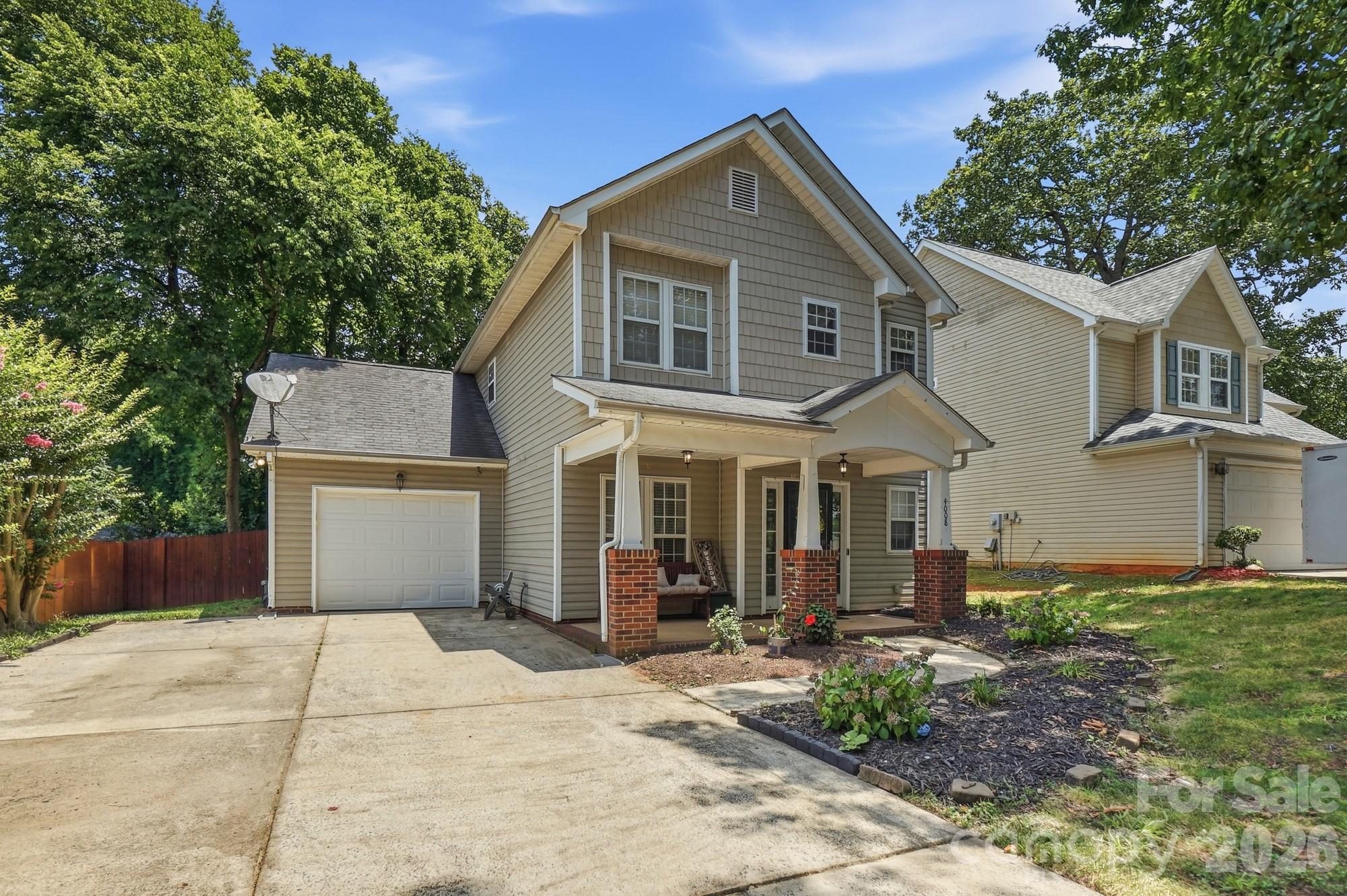 Charming two-story home that is move-in ready! This inviting home welcomes you with a covered front porch, perfect for relaxing and enjoying your morning coffee. Inside, you'll find beautiful floors throughout the main level, a spacious family room with a gas log fireplace, dining room and 1st floor laundry room.  Step outside to your own backyard retreat, ideal for entertaining or unwinding after a long day. Perfect for both 1st time home buyers and buyers looking for low maintenance living!  Conveniently located just minutes from I-85. Ask about down payment assistance!