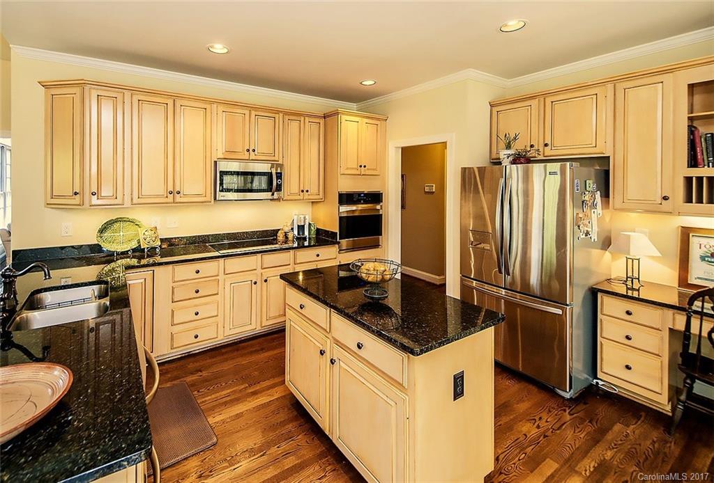 MAKE AN OFFER! SELLERS ARE MOTIVATED!! ELEGANT home in the desirable Carmel Country Club community! Enjoy the golf course views as you stroll through the neighborhood. Sip your morning coffee on the brick patio overlooking acres of woodlands. Separate upstairs guest bed and bath are perfect for college kids or mother-in-law. Open floor plan, vaulted ceilings, maple glazed cabinets, whirlpool jet tub, sealed foundation, new Heat/Air, GAF slate line roof, and more.  Great home and community.