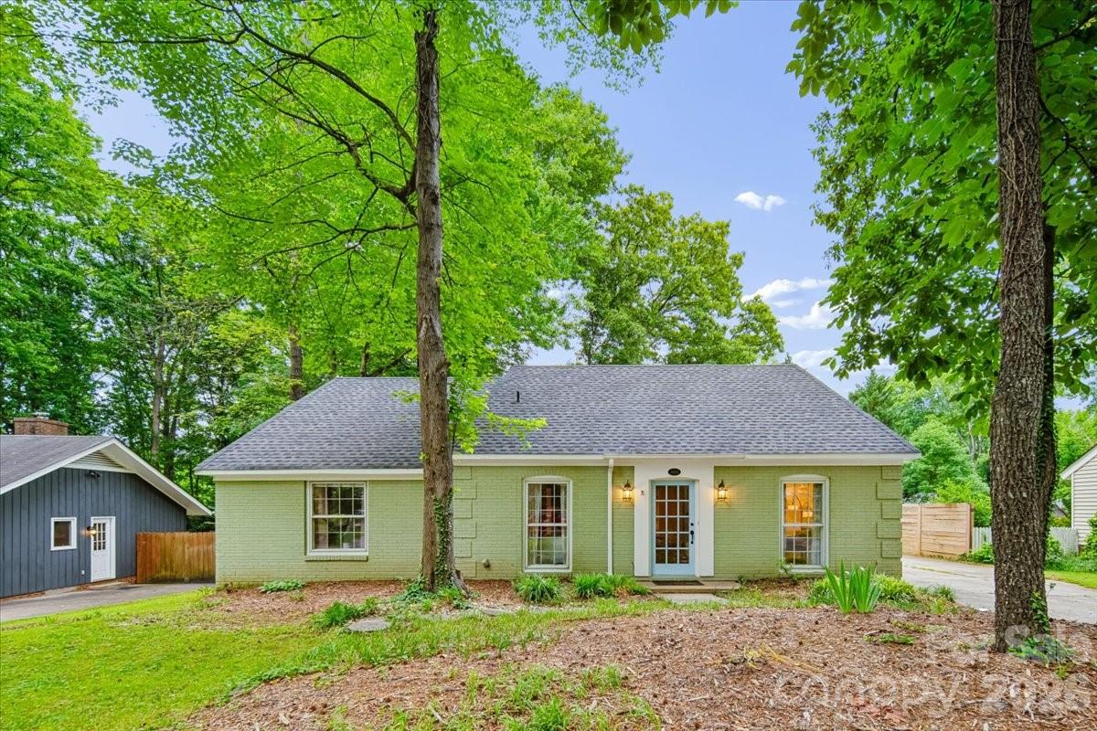 Priced 60K lower than the median Charlotte home price and offering 10K in concessions on top of a full price offer towards paint or flooring, this charming 3-bedroom home tucked into Parkview East in one of southeast Charlotte’s most convenient pockets can't be beat. Set on a peaceful, wooded lot, this home offers the privacy buyers want with the access they need—just minutes from Monroe Road, Independence Boulevard, Uptown, Cotswold, Matthews, and everyday shopping and dining. Inside, an easy, functional layout makes this the perfect starter home, investment, or right-size opportunity, with comfortable living spaces and plenty of potential to make it your own. Out back, the oversized deck is the standout—ideal for grilling, entertaining, morning coffee, or relaxing above the private tree-lined backyard with an attached storage shed for tools, complete w/new roof in 2025. The location continues to get better, with major momentum along the Independence/US-74 corridor, including planned roadway improvements and ongoing discussion around Charlotte’s future Silver Line transit vision. Nearby Mason Wallace Park offers fields, courts, playgrounds, picnic areas, and green space, while McAlpine Creek Park and Greenway give you miles of trails for walking, running, and biking. Add in East Charlotte favorites, international dining, coffee, and quick access to Plaza Midwood and Oakhurst, and this home delivers location, lifestyle, and value in one smart package for today’s buyer seeking comfort, convenience, and long-term upside. Plus this property qualifies for $10,000 in closing costs/down payment assistance, No PMI, and potentially 100% financing!